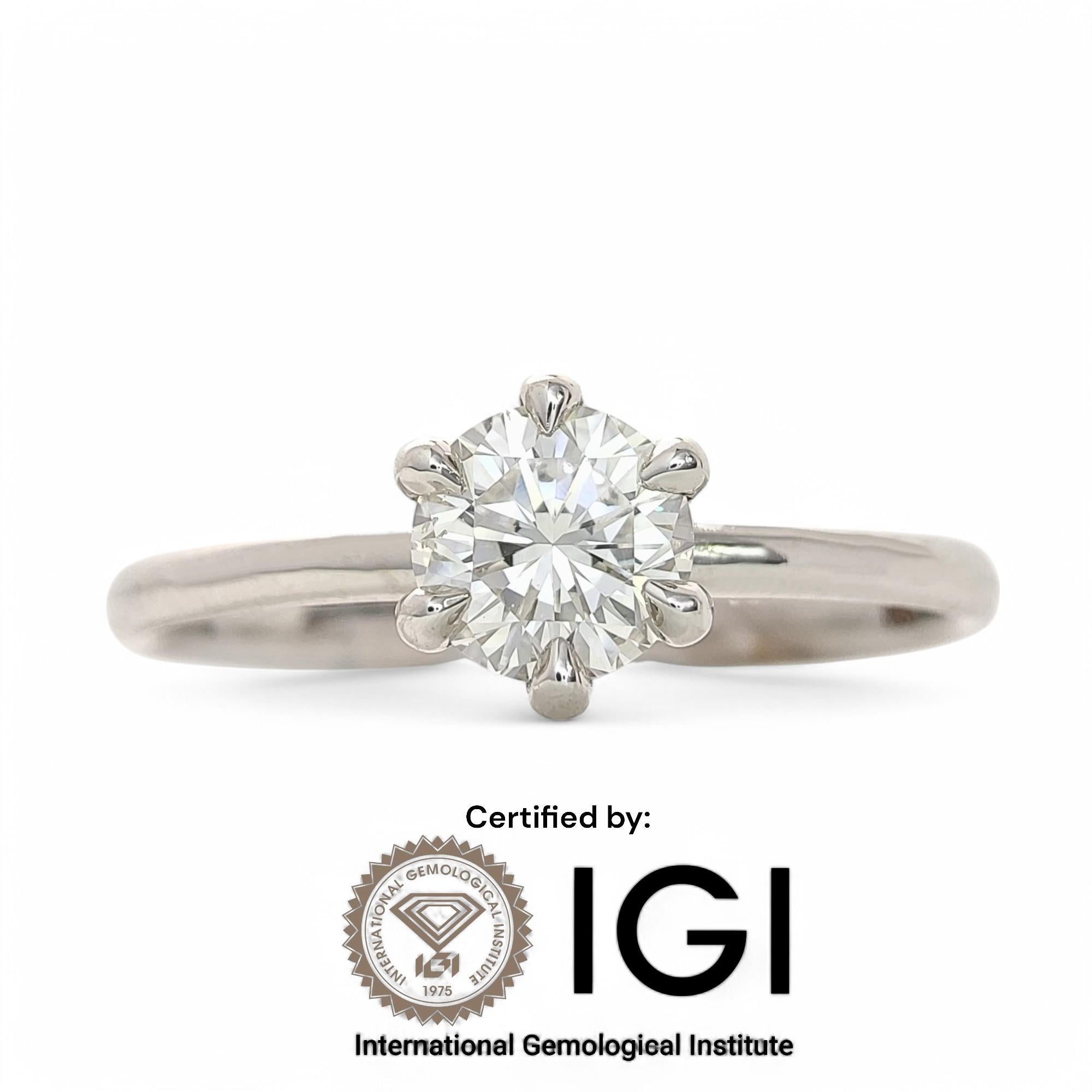 Bague solitaire en or blanc 18 carats avec diamant naturel de 0,40 ct - certifié IGI

Cette exquise bague solitaire est un véritable symbole d'élégance et de sophistication, réalisée en or blanc massif 18K. Conçu pour ceux qui apprécient la