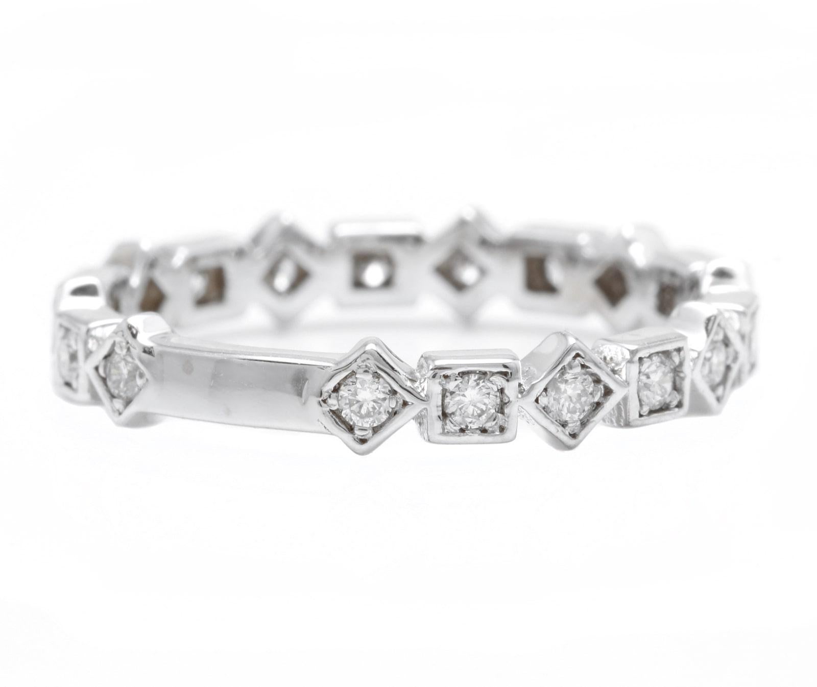 Splendid 0.40 Carats Natural Diamond 14K Solid White Gold Ring

Stamped: 14K

Total Natural Round Cut Diamonds Weight: Approx. 0.40 Carats (color G-H / Clarity SI1-SI2)

The width of the ring is: 3.5mm

Ring size: 7 (free sizing available)

Item