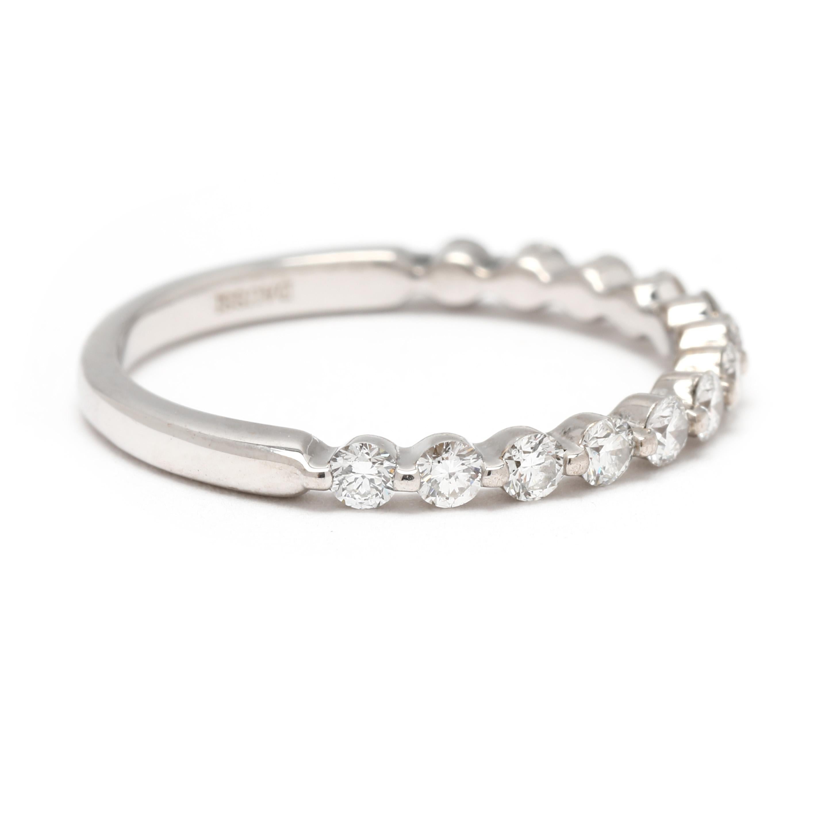 Stones:
diamonds, 13 stones
round brilliant cut
2.1 mm
approximately .40 total carats
F-G color, VS2-I1 clarity
*2 w/ minute chips

Ring Size 6.25

Width: 2.2 mm

Weight: 1.9 dwts. / 2 grams

Stamps: 