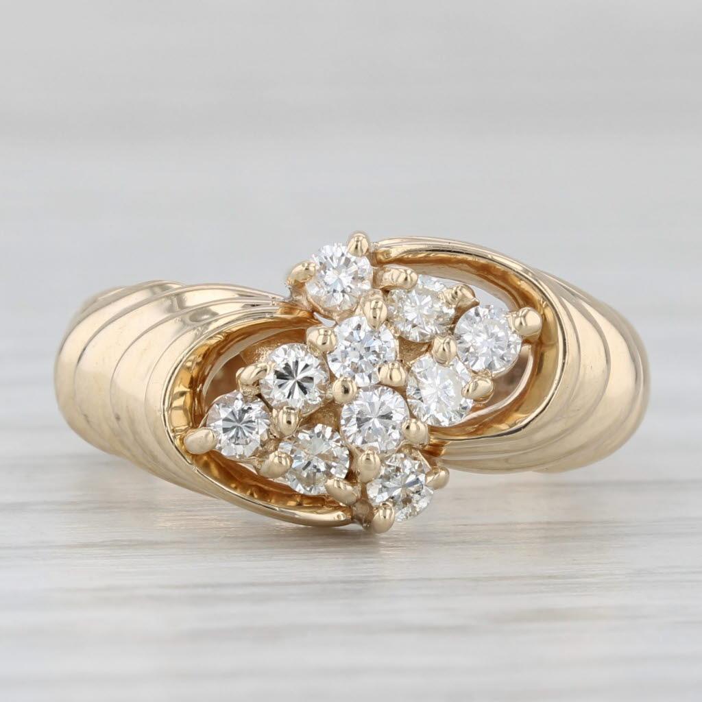 0.40ctw Diamond Cluster Ring 14k Yellow Gold Size 4.75 Beveled Bypass In Good Condition For Sale In McLeansville, NC