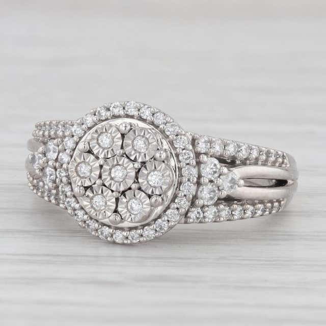 1/3Ct TDW Diamond 10K White Gold Halo Engagement Ring 1/3Ct TDW Diamond 10K White Gold Halo Engagement Ring