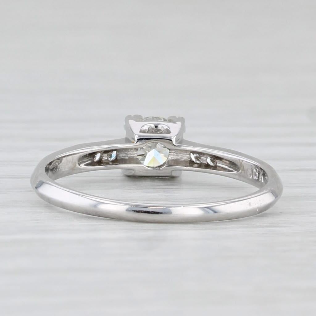 Gemstone Information:
- Natural Diamond -
Carats - 0.35ct 
Cut - Round Brilliant
Color - J - K
Clarity - VS2

- Natural Diamonds -
Total Carats - 0.05ctw
Cut - Single
Color - F - G
Clarity - VS2 - SI1

Metal: 18k White Gold 
Weight: 2.2 Grams
