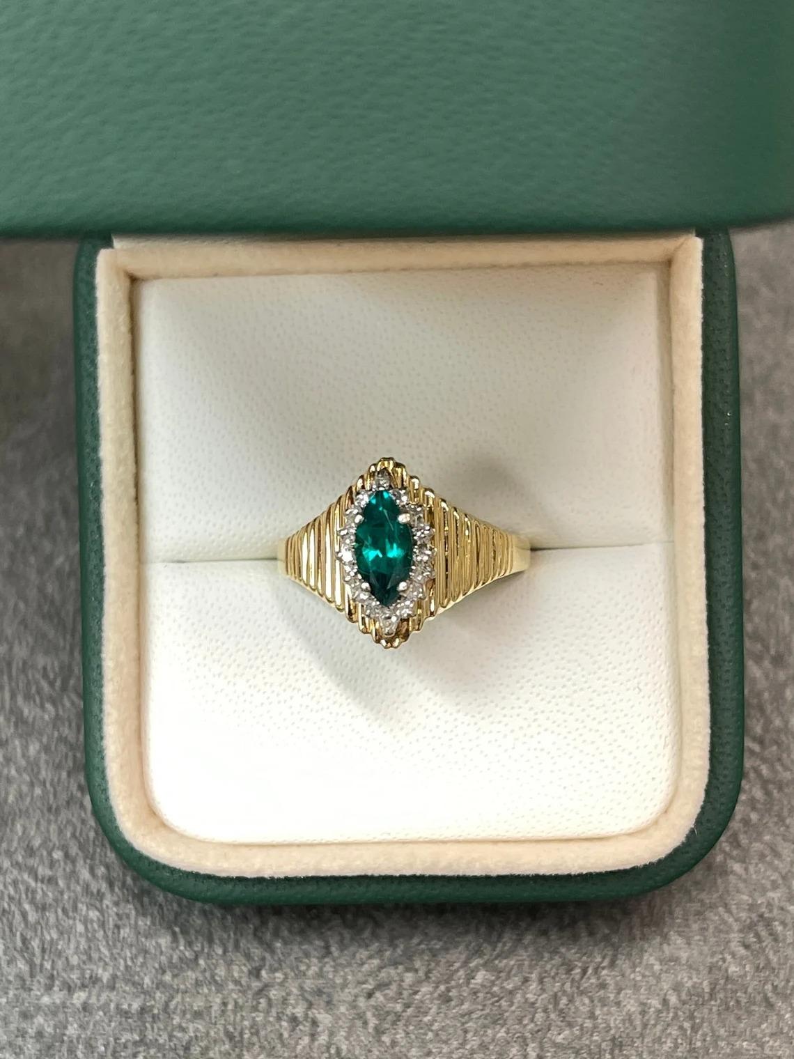 Modern 0.40tcw 14K Marquise Cut Emerald & Diamond Halo Cocktail Ring For Sale