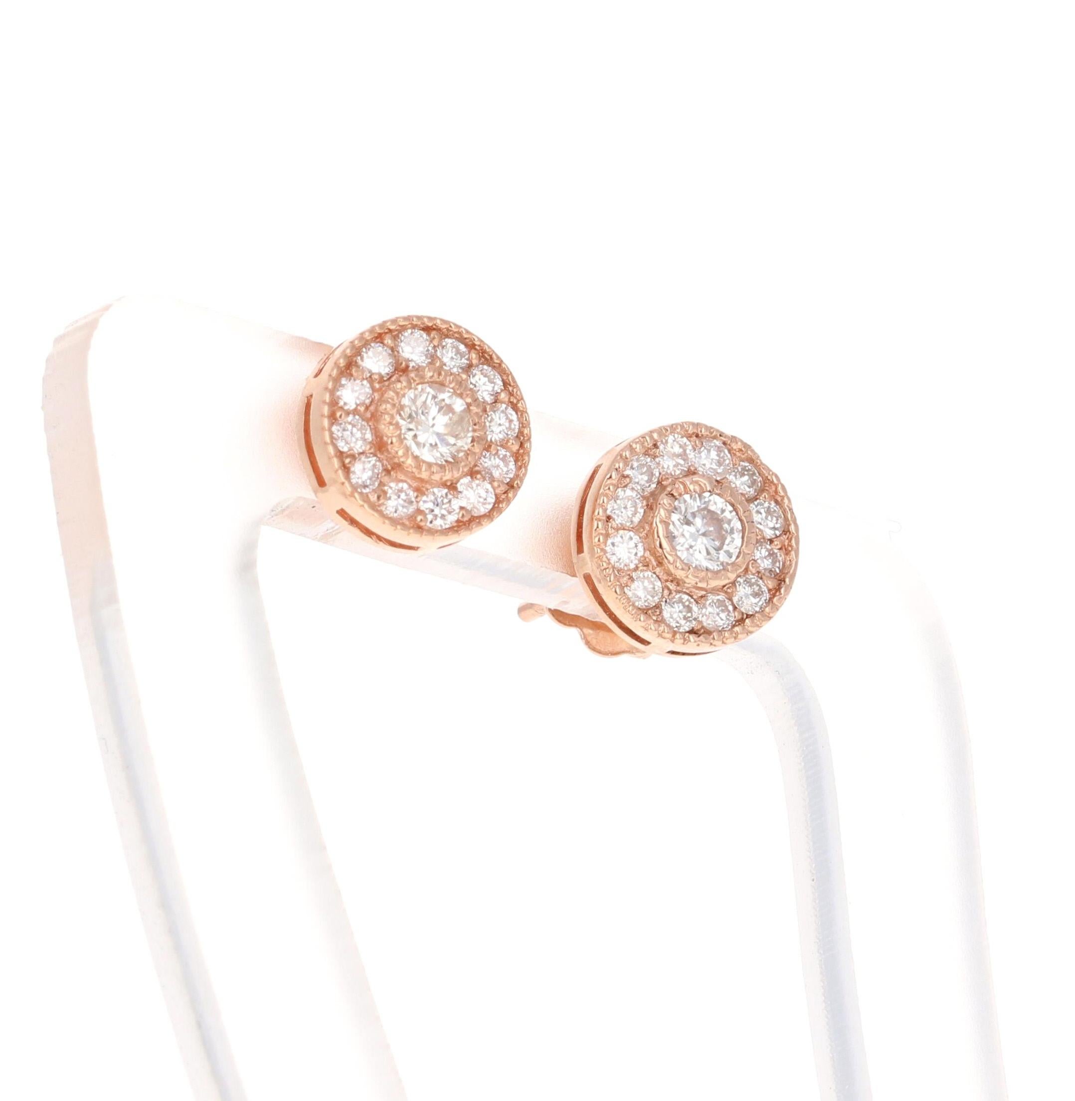 This unqiue design of diamond earrings has 26 Round Cut Diamonds that have 0.41 carats and a clarity and color of VS-H. 
They are set in 14 Karat Rose Gold and weigh 1.5 grams

The width of the earrings are 8.5 mm. 



