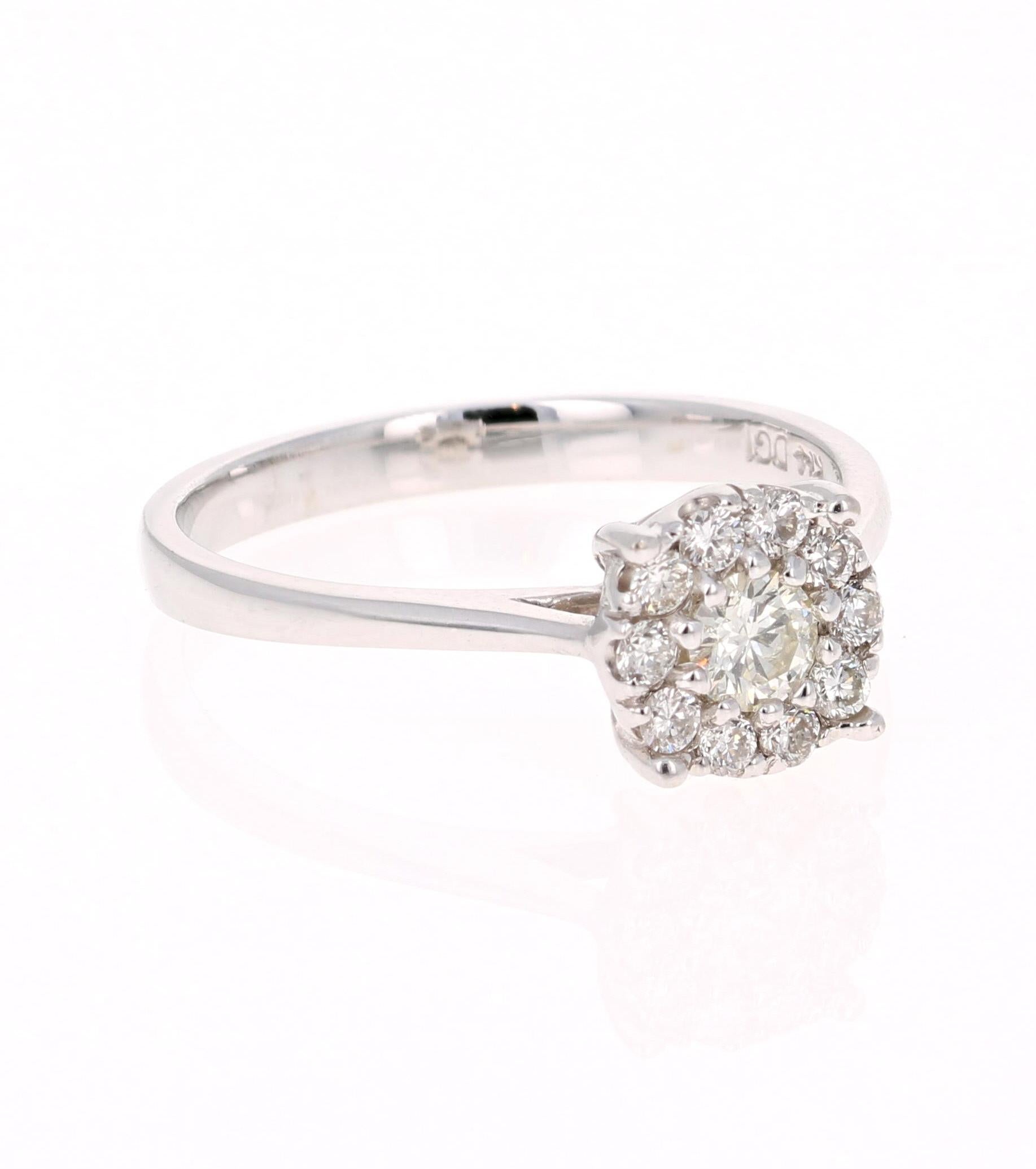 Beautiful Engagement or Every Day Ring!

This beautiful ring has 1 Round Cut Diamond that weighs 0.19 Carats and has 10 Round Cut Diamonds floating around it that weigh 0.22 Carats. The total carat weight of the ring is 0.41 Carats. The clarity and