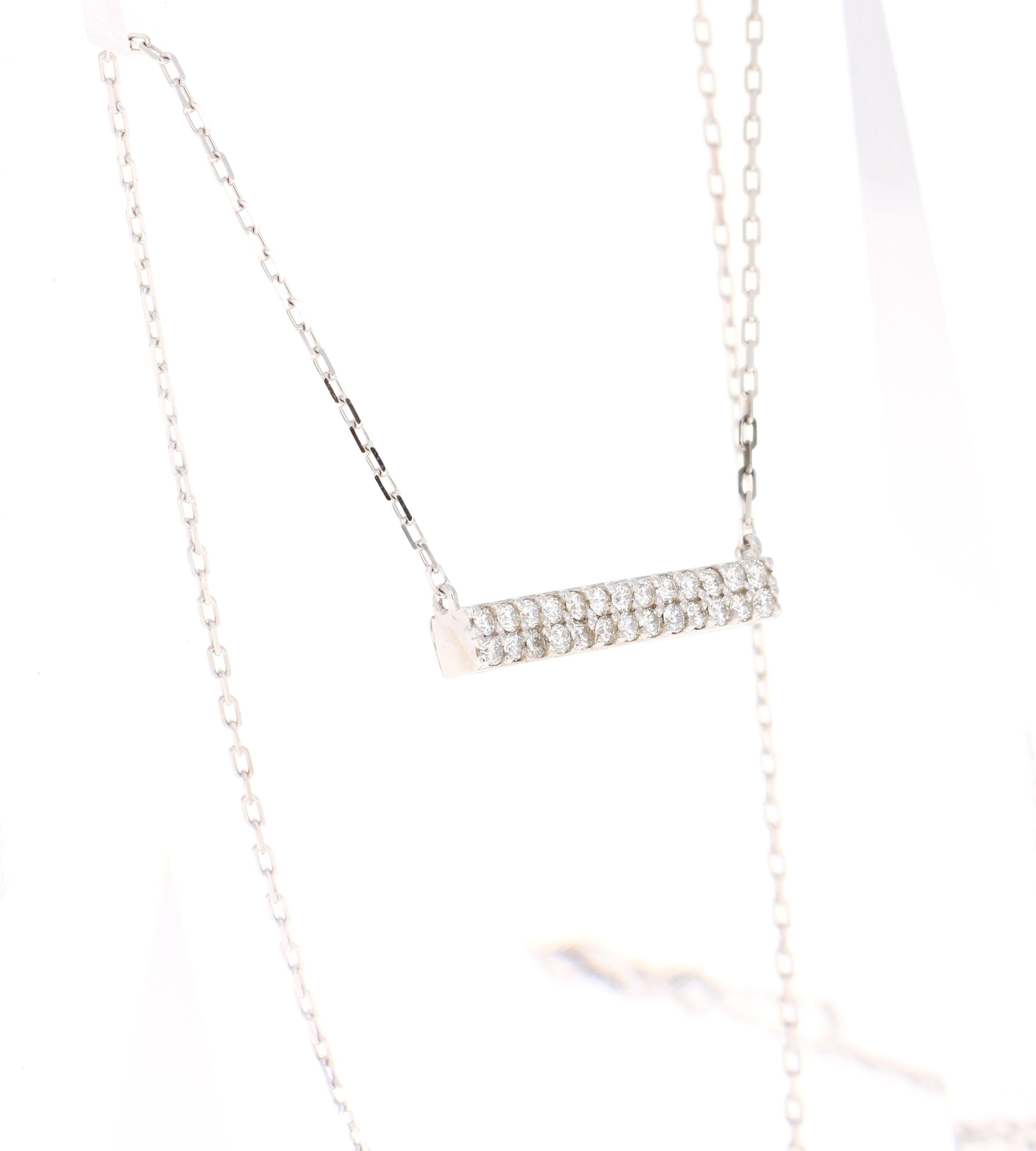 This Chain Necklace has a Diamond Bar that has 26 Round Cut Diamonds (Clarity: SI, Color: F) that weigh 0.41 Carats. The total carat weight of the Pendant is 0.41 Carats.

It is beautifully curated in 14 Karat White Gold and weighs approximately 3.3