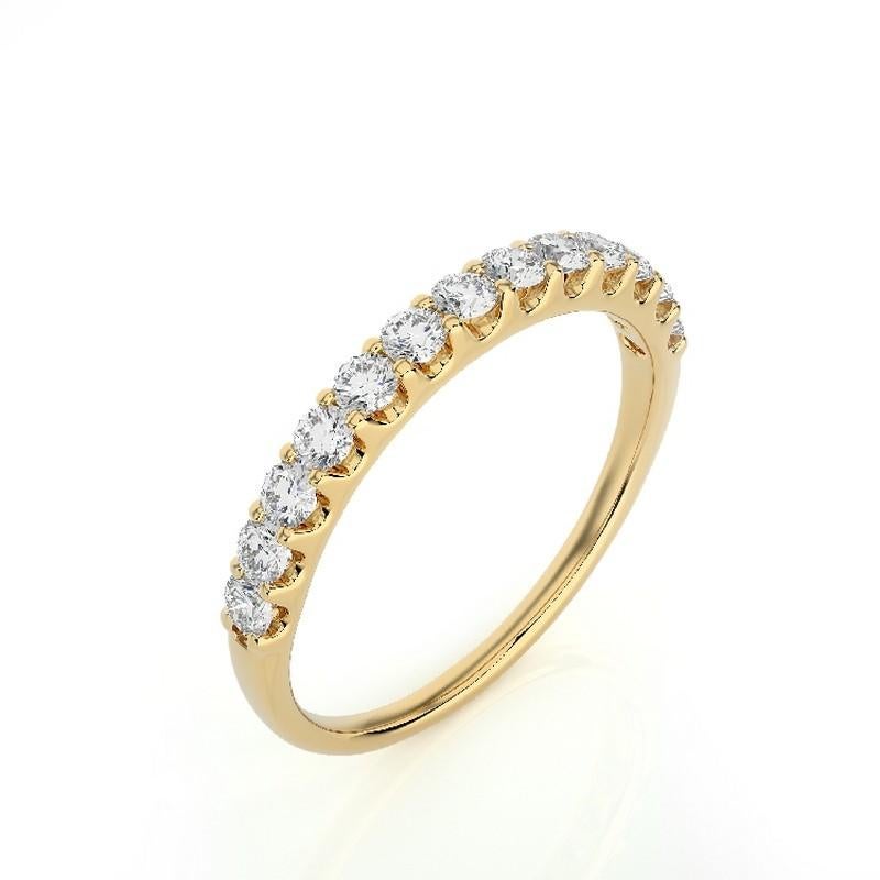 Diamond Total Carat Weight: This elegant 1981 Classic Collection wedding ring features a total carat weight of 0.41 carats, showcasing 13 excellent round diamonds that add a touch of sparkle and sophistication.

Gold Setting: Crafted with precision