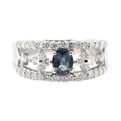 0.41 Carat, Natural, Color-Change Alexandrite and Diamond Ring Set in Platinum