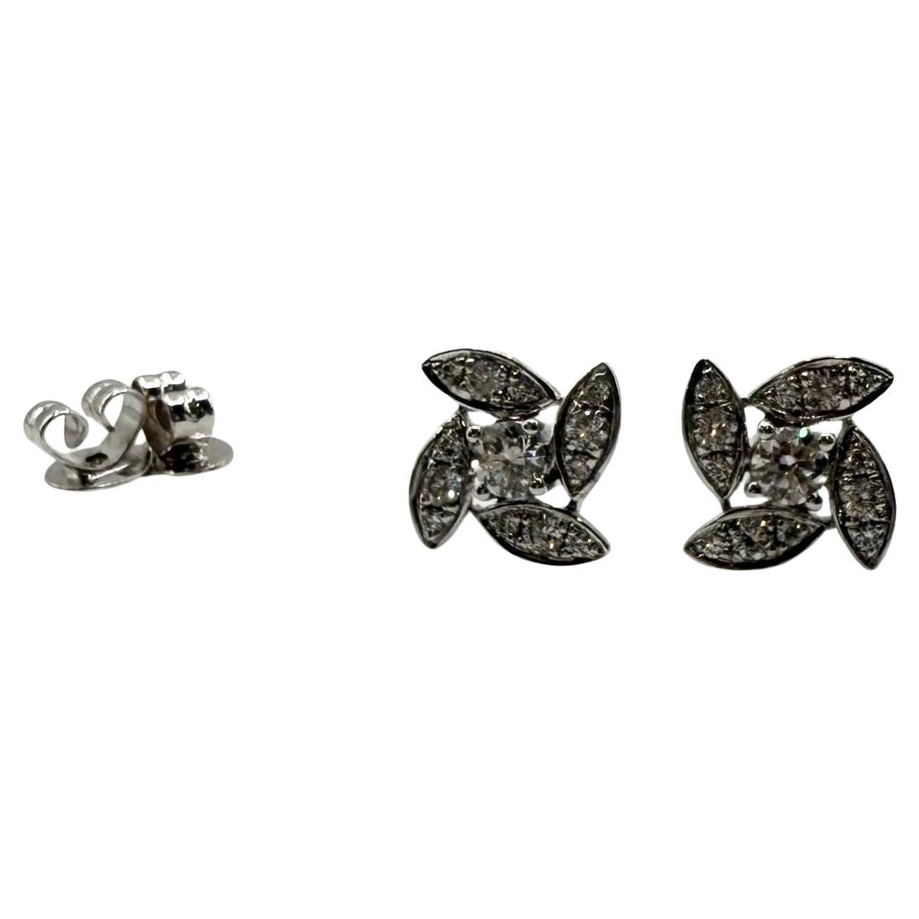 0.41 carats Diamond studs earrings 18KT gold floral studs For Sale