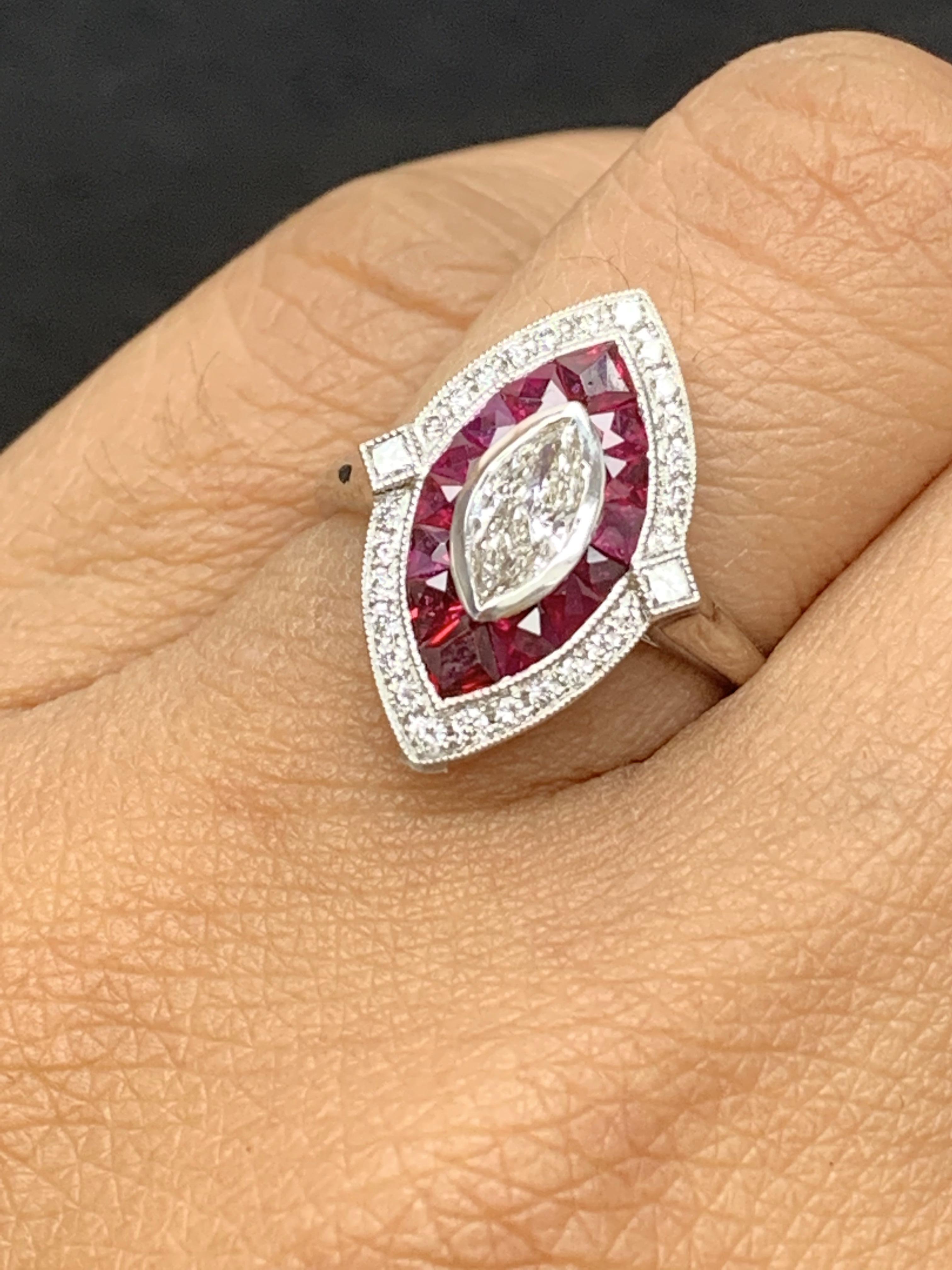 A beautiful cocktail ring style showcasing a 0.41-carat marquise cut diamond, surrounded by a single row of baguette shape 14 rubies weighing 0.71 carats and another row of 28 brilliant diamonds in an accented 14K white gold mounting. Accent