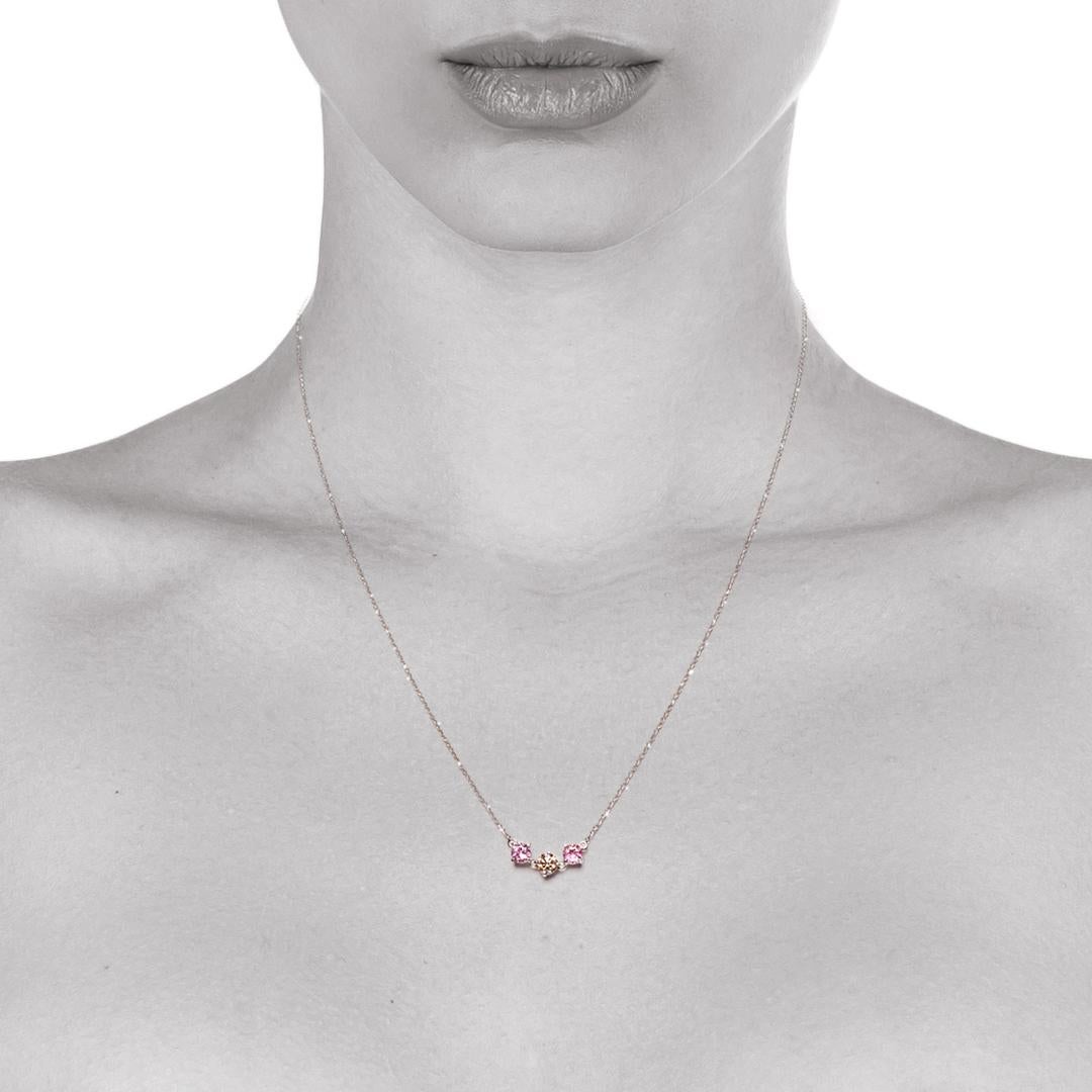 This simple yet stunning pair necklace features a claw-set Round Argyle Champagne diamond flanked by one round pink tourmaline on each side. It is an easy to wear necklace with an adjustable length chain to suit all occasions (lengths available at