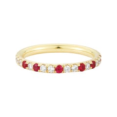 .042 Carat Diamond and .23 Carat Ruby Speckled 18 Karat Gold Eternity Band