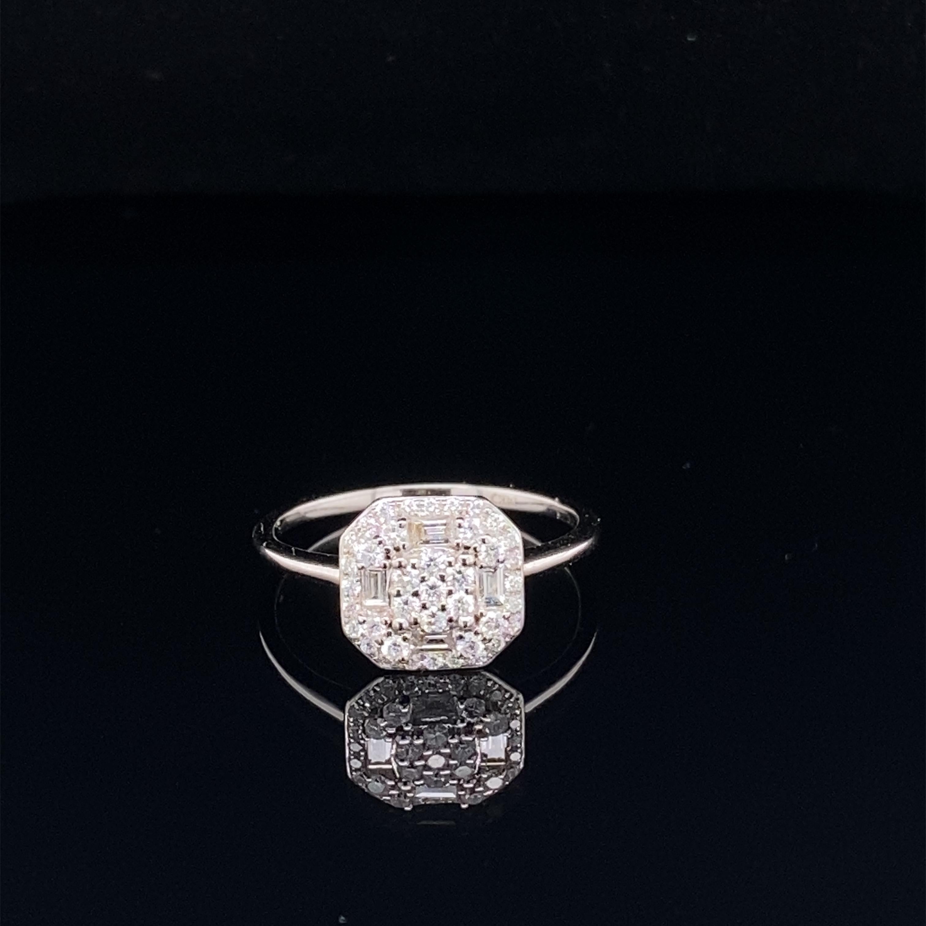 This stunning ring features a beautiful Cushion Cluster of White Diamonds comprising of Baguette and Round Diamonds.
This ring is set in 18K White Gold.
Total Diamond Weight = 0.42 Carats. Ring Size is 6 1/2.