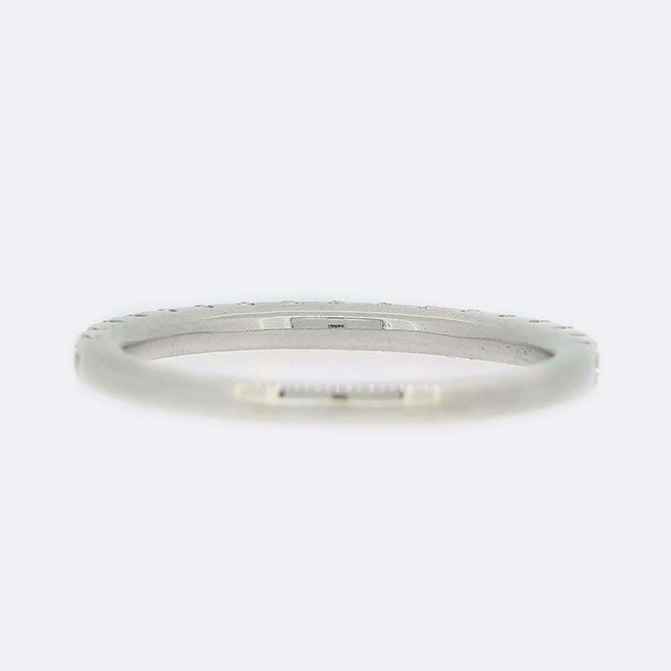 This is an 18ct white gold diamond half eternity ring. The ring features 16 round brilliant cut diamonds which are well matched for colour and clarity.

Condition: Used (Very Good)
Weight: 2.1 grams
Size: M 1/2 (53)
Band Width: 2mm
Total Diamond