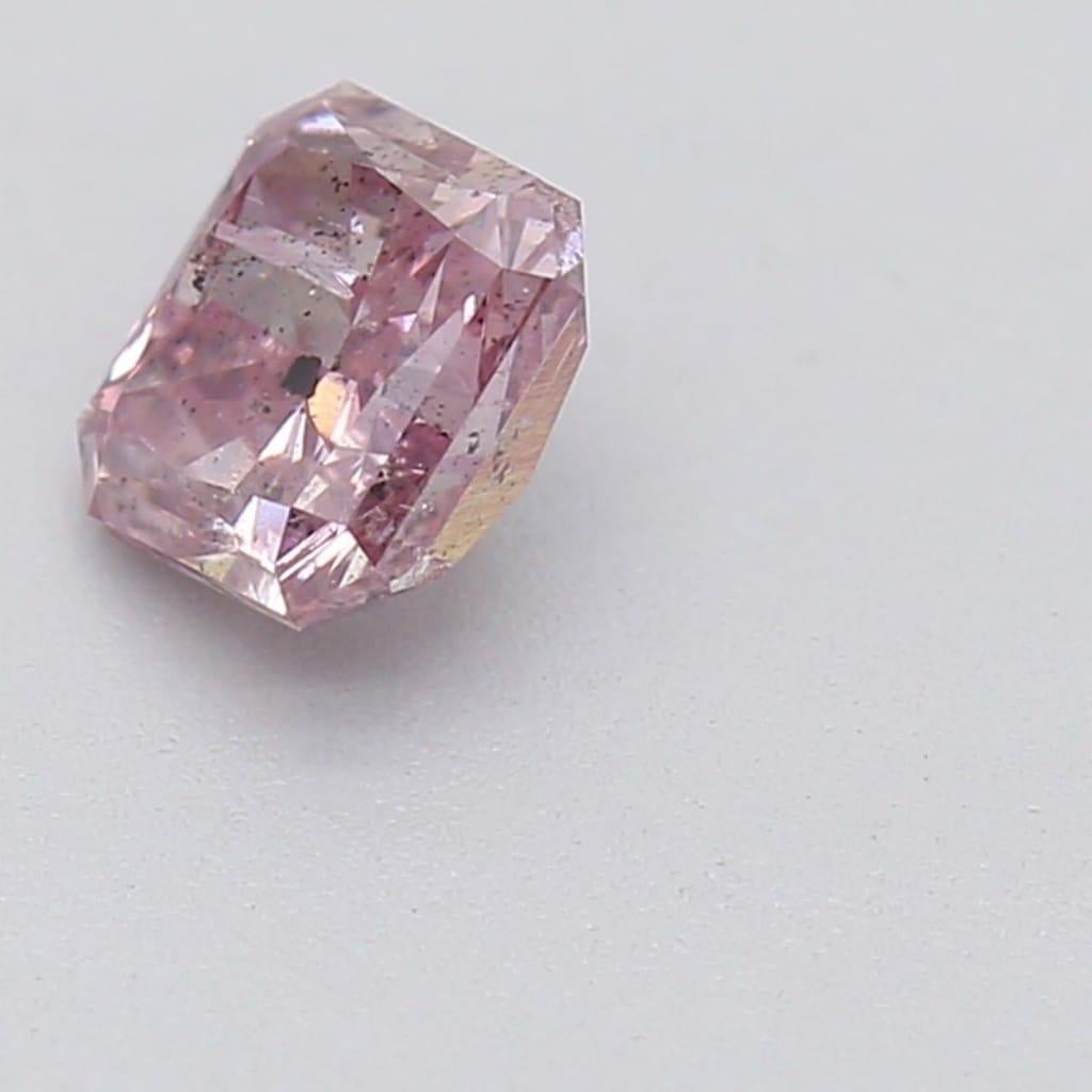 *100% NATURAL FANCY COLOUR DIAMOND*

✪ Diamond Details ✪

➛ Shape: Radiant
➛ Colour Grade: Fancy Intense Purplish Pink
➛ Carat: 0.42
➛ Clarity: I2
➛ GIA Certified 

^FEATURES OF THE DIAMOND^

This fancy intense purplish-pink diamond is a rare and