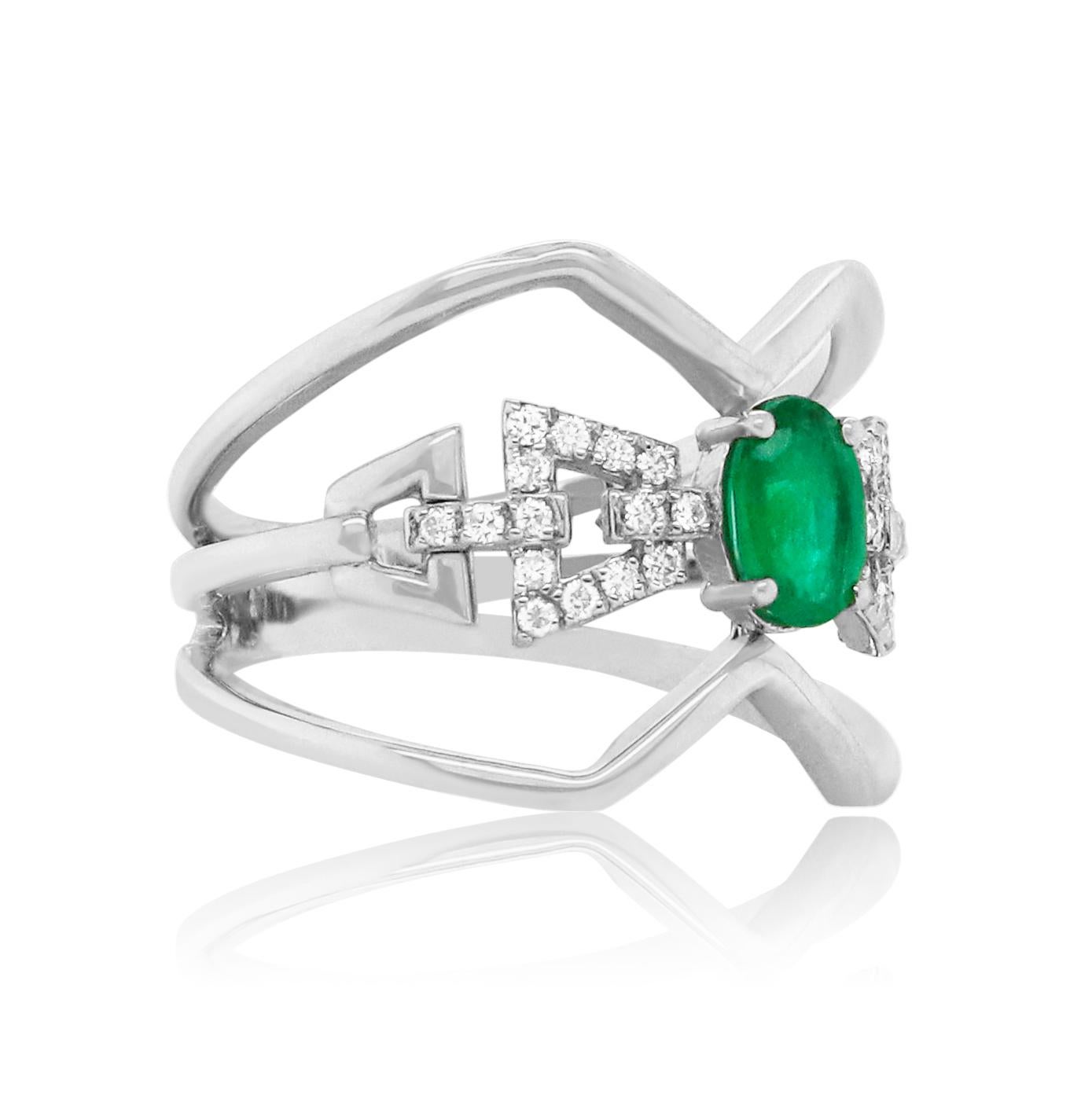 Material: 14k White Gold
Gemstones: 1 Oval Shaped Emerald at 0.42 Carats- Measuring 6 x 4 mm
Diamonds: 30 Brilliant Round White Diamonds at 0.14 Carats. SI Clarity / H-I Color. 

Fine one-of-a kind craftsmanship meets incredible quality in this
