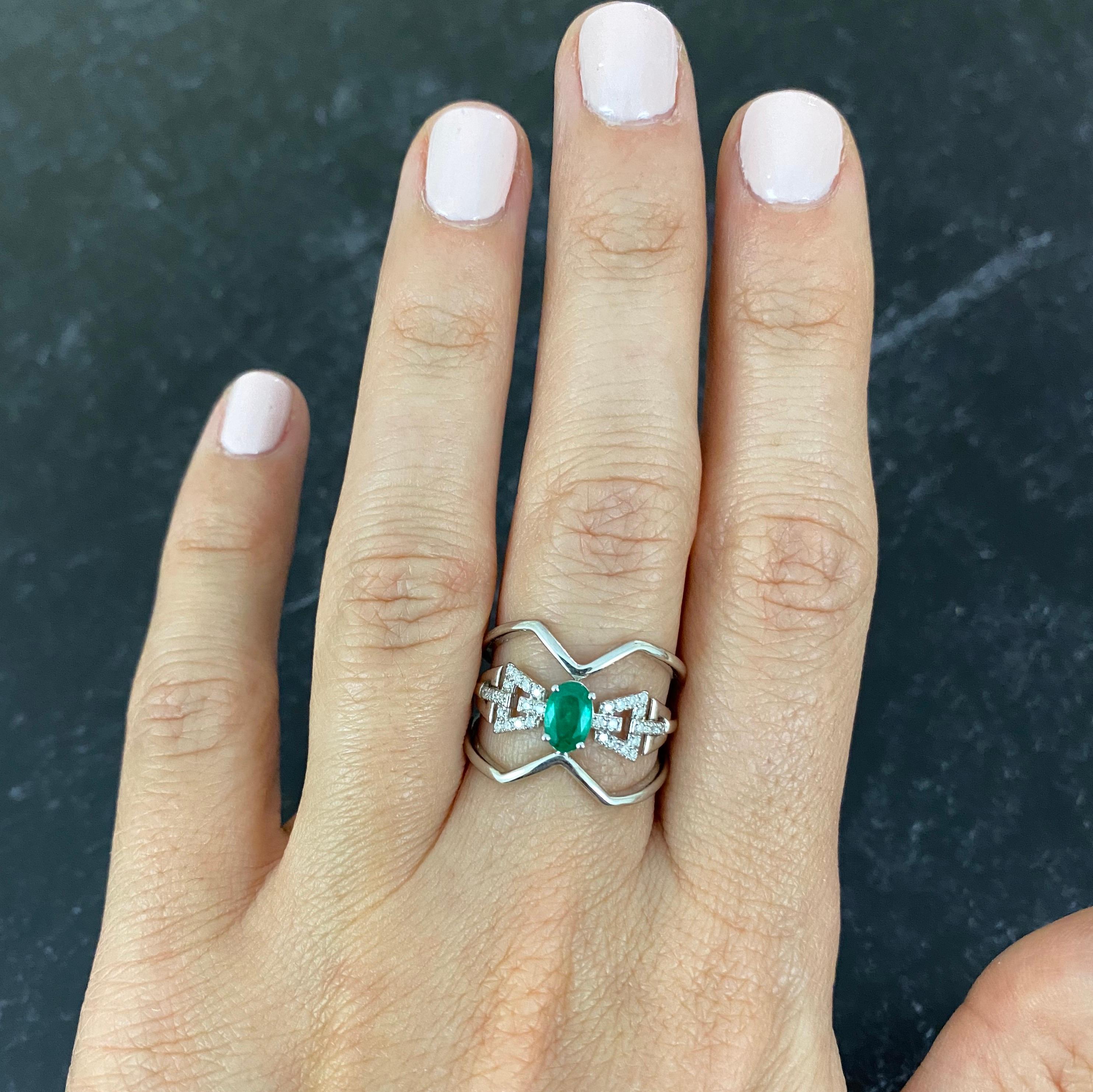 Contemporary 0.42 Carat Oval Emerald and Diamond Ring 14 Karat White Gold