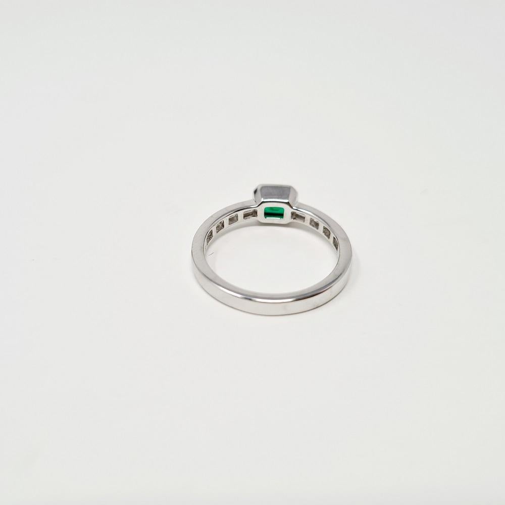Baguette Cut 0.42 Ct Emerald 0.35 Ct Diamonds 18kt White Gold Solitaire Ring For Sale