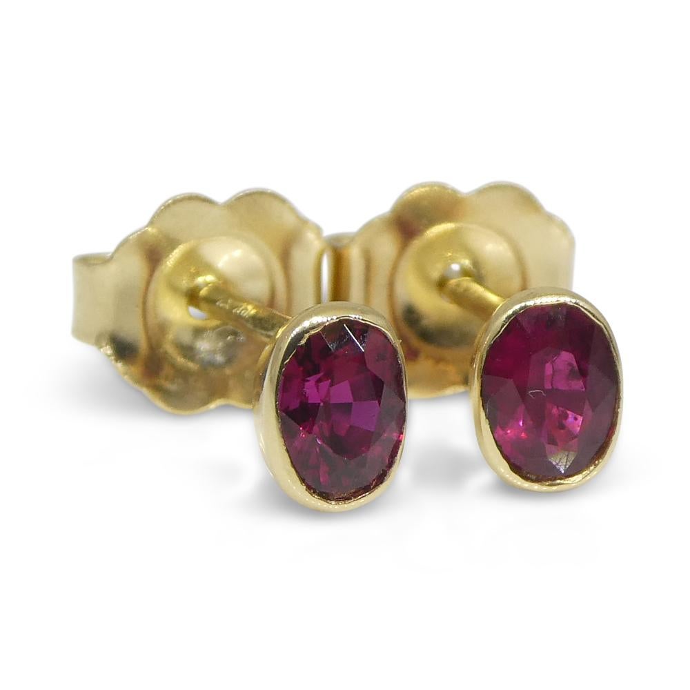 0.42ct Oval Red Ruby Stud Earrings set in 14k Yellow Gold For Sale 1