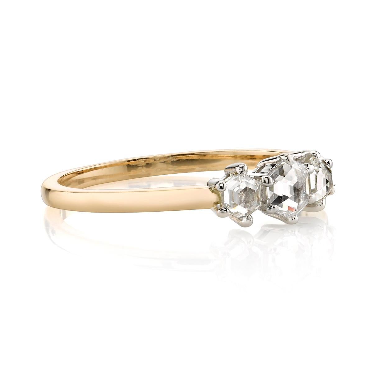 0.42ctw hexagonal rose cut diamonds set in a handcrafted 18K yellow gold and platinum three stone ring.  

Ring is currently size 6. Please contact us about potential re-sizing.

Our jewelry is made locally in Los Angeles and most pieces are made to