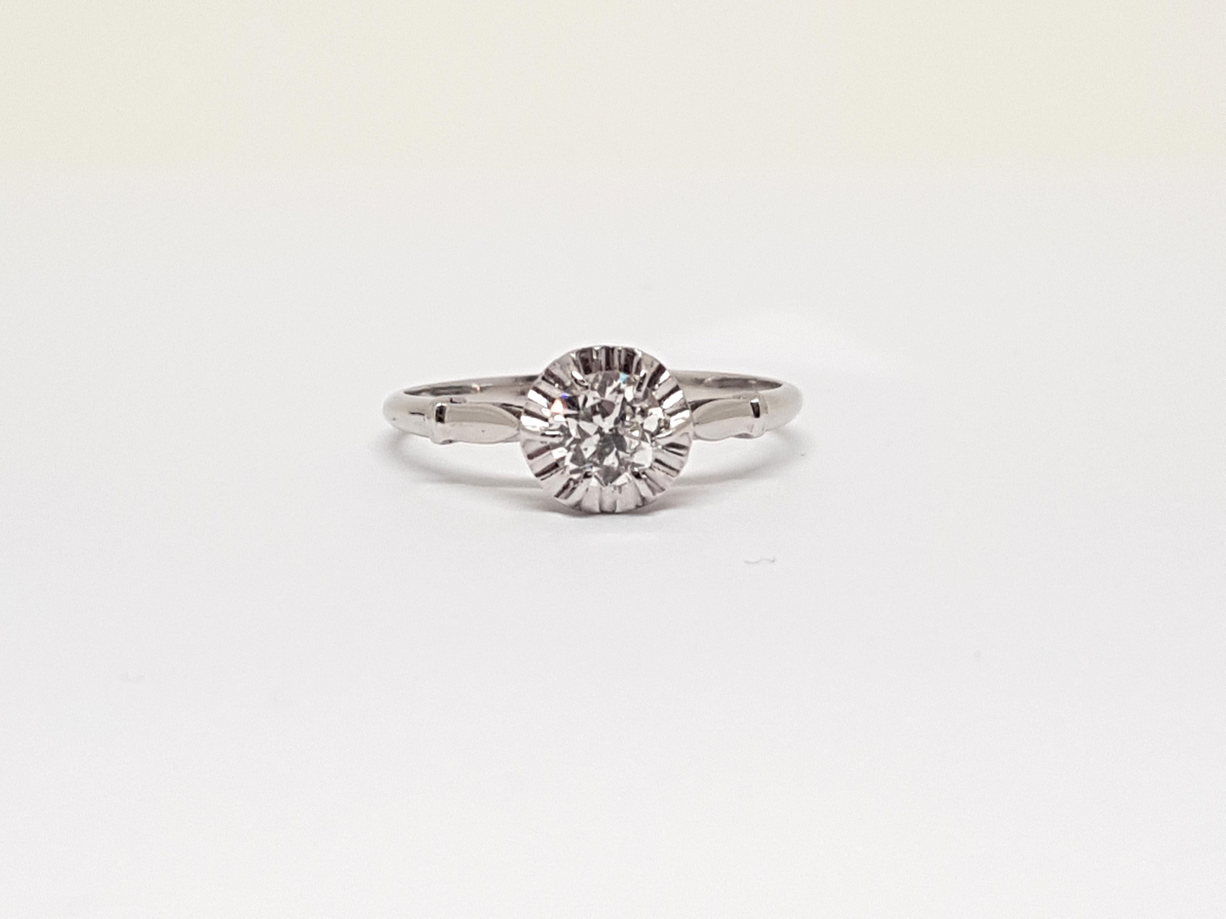 Gold: 18K White Gold. 
Weight: 2,47 gr. 
Diamonds: 0,43ct. G / VS 
Width: 0,7 cm 
Ringsize: 52 / 16,50mm 
Free resizing of ring up to size 70 / 22mm 
Shipping: free worldwide insured shipping 
All of our jewellery comes with a certificate and a 5