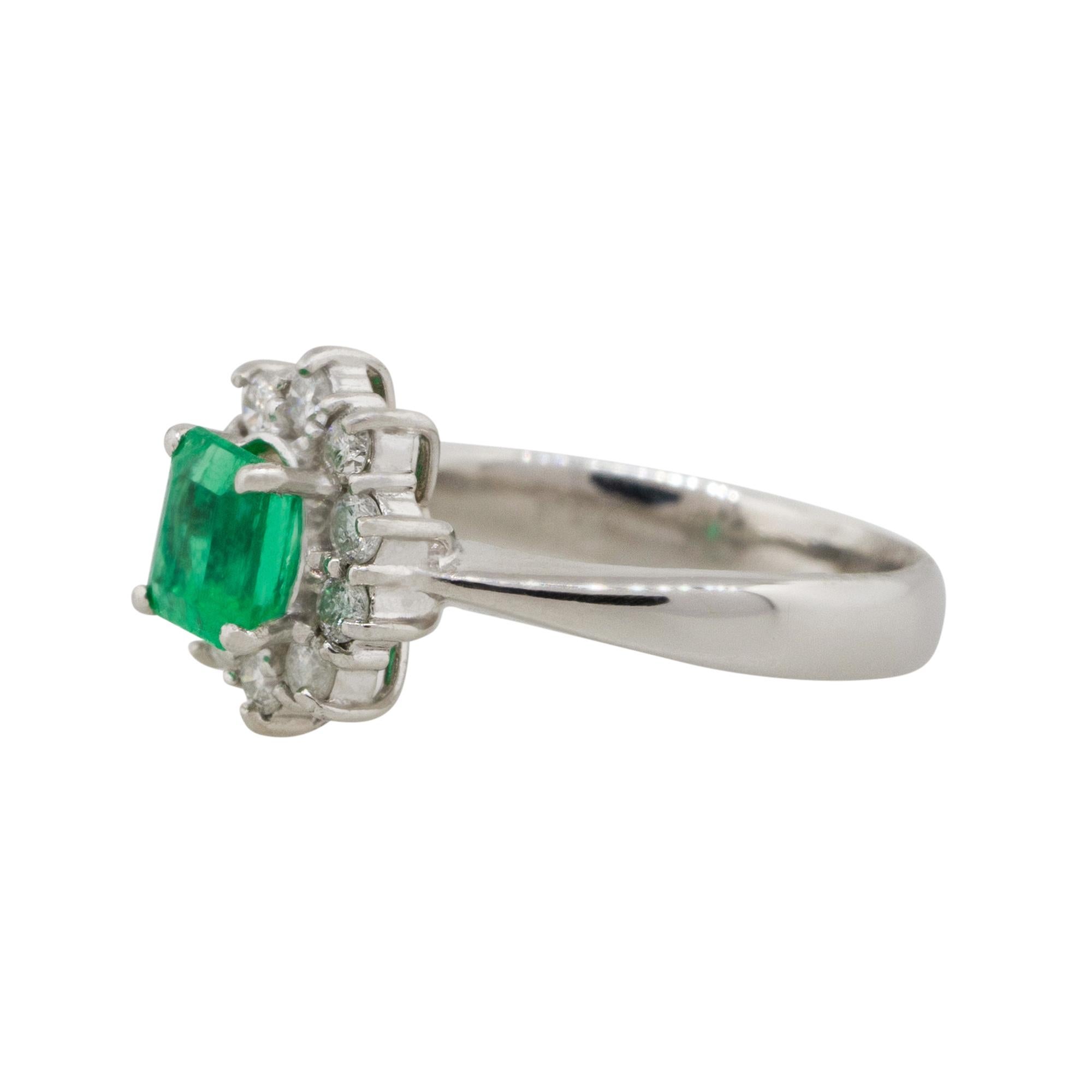 Material: Platinum
Gemstone details: Approx. 0.43ctw square shaped Emerald gemstone
Diamond details: Approx. 0.26ctw of round cut diamonds. Diamonds are G/H in color and VS in clarity
Ring Size: 5.75 
Ring Measurements: 0.55