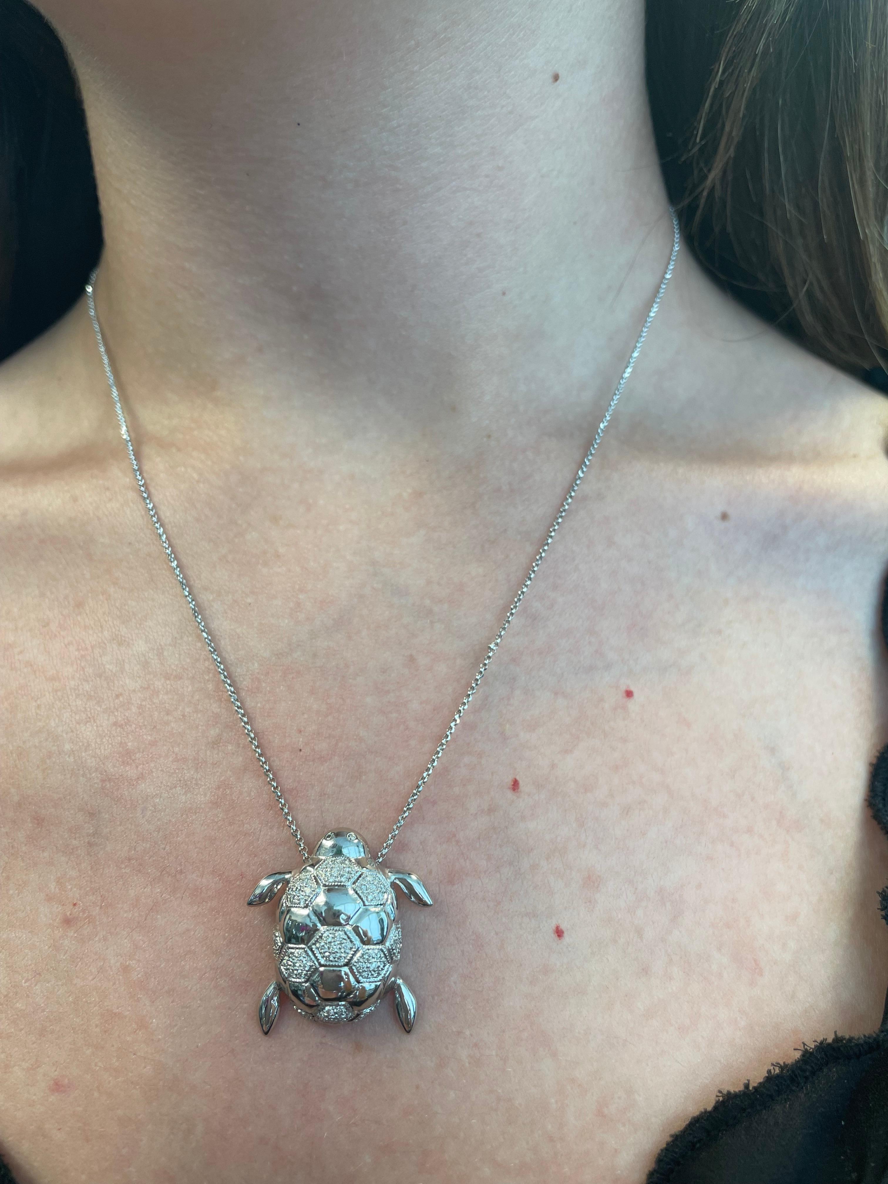 Beautiful modern diamond turtle necklace white gold.

0.43ct of round diamonds, approximately G/H color and SI clarity. 18-karat white gold.

Accommodated with an up-to-date digital appraisal by a GIA G.G. once purchased, upon request. Please