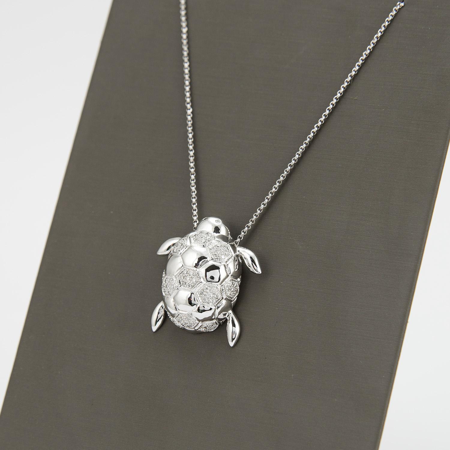 white gold turtle pendant