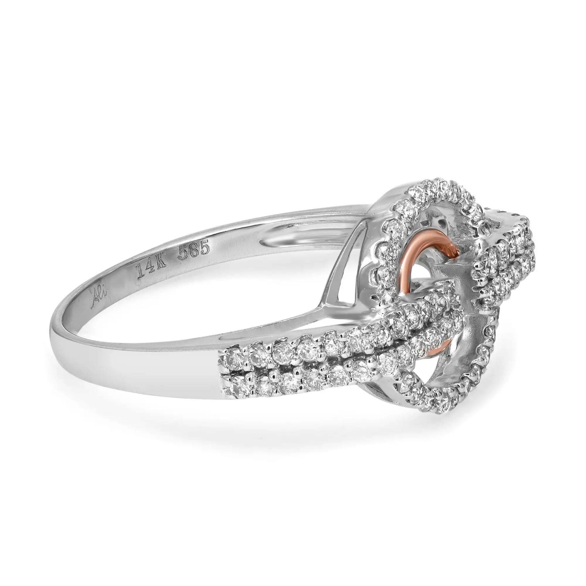 Chic and Trendy, ladies diamond ring. This ring features prong set round brilliant cut diamonds set on a circular pattern. Crafted in high polished 14k white gold with a 14K rose gold ring in the center. Total diamond weight: 0.43 carat with color I