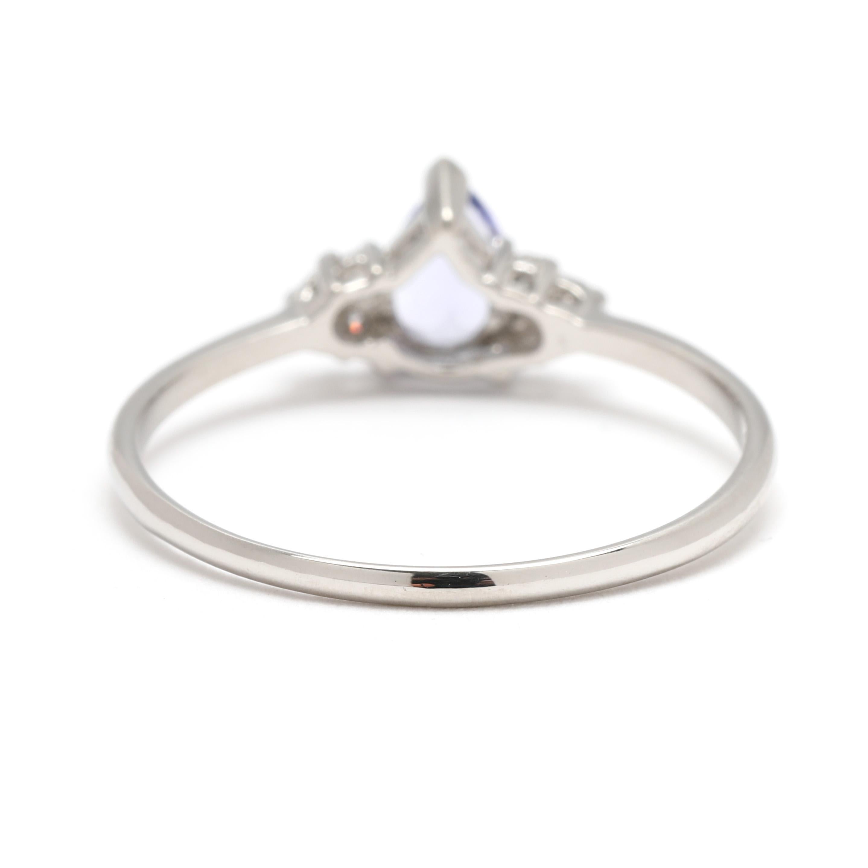 Taglio a goccia Anello con tanzanite e diamanti da 0,43 carati Anello a tre pietre, platino, misura 7,25 in vendita
