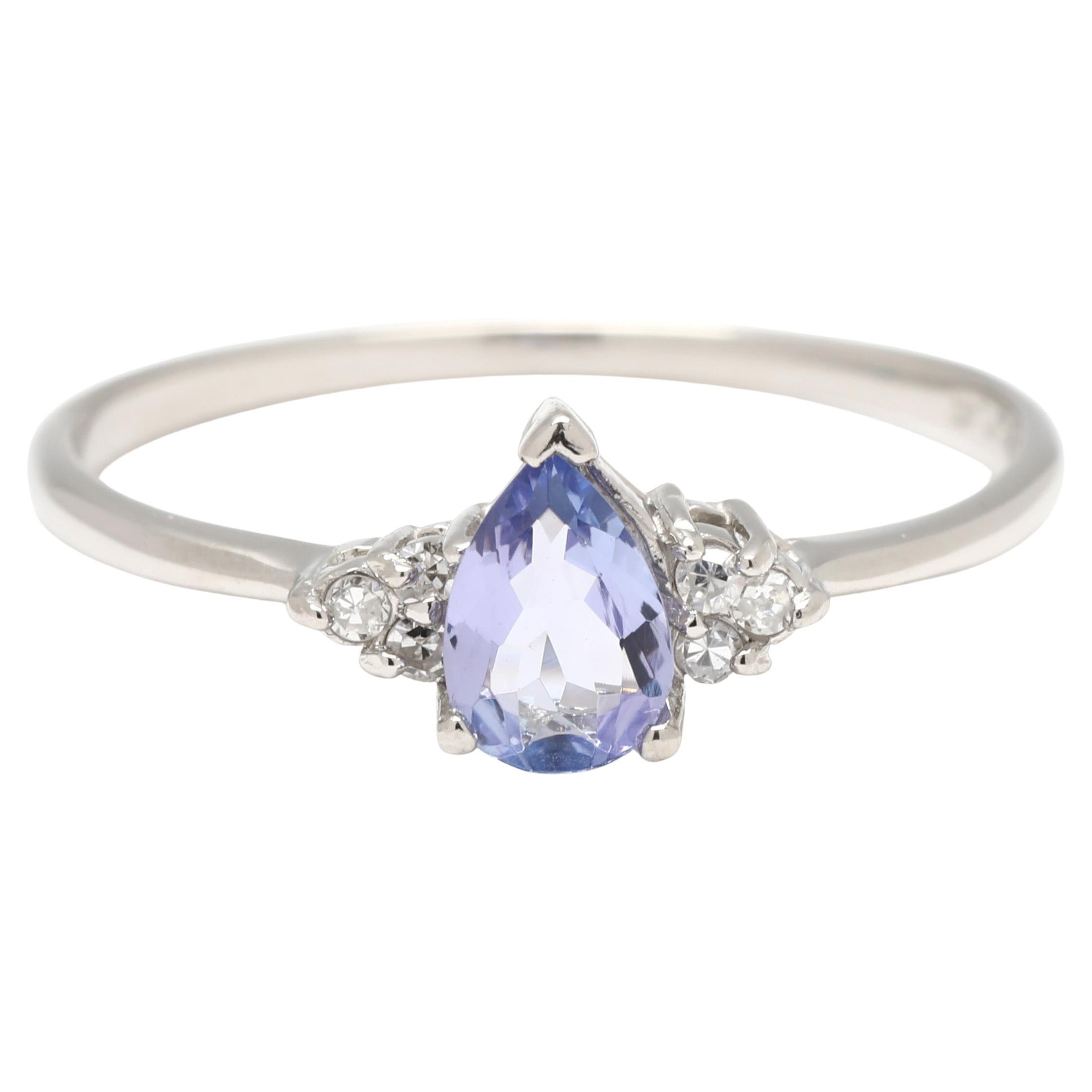 Anello con tanzanite e diamanti da 0,43 carati Anello a tre pietre, platino, misura 7,25