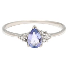 Anello con tanzanite e diamanti da 0,43 carati Anello a tre pietre, platino, misura 7,25