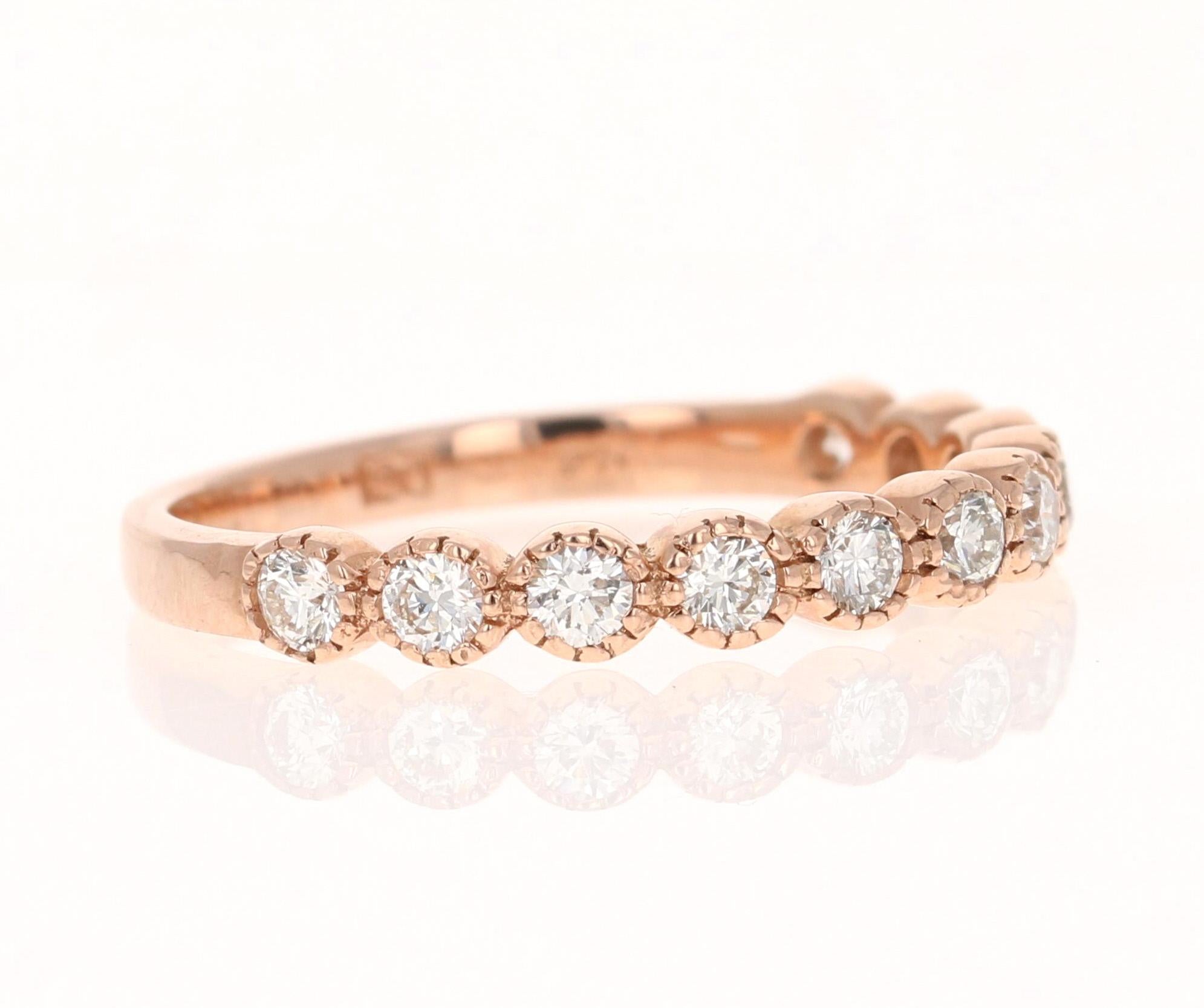 0.44 Carat Round Cut Diamond 14 Karat Rose Gold Band Ring

This ring features a series of round cut diamonds with a total carat weight of 0.44. The diamonds are white, with a clarity grade of VS2 and a color grade of H.

Crafted in 14K Rose Gold,