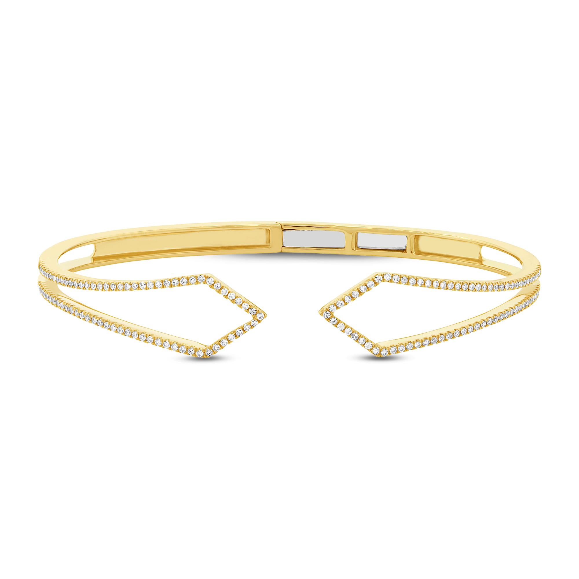 This versatile diamond bangle features a beautiful kite shaped design studded with 0.44ct of round brilliant cut diamonds graded at E-F, VS1-VS2. The diamonds are set in 14k yellow gold.