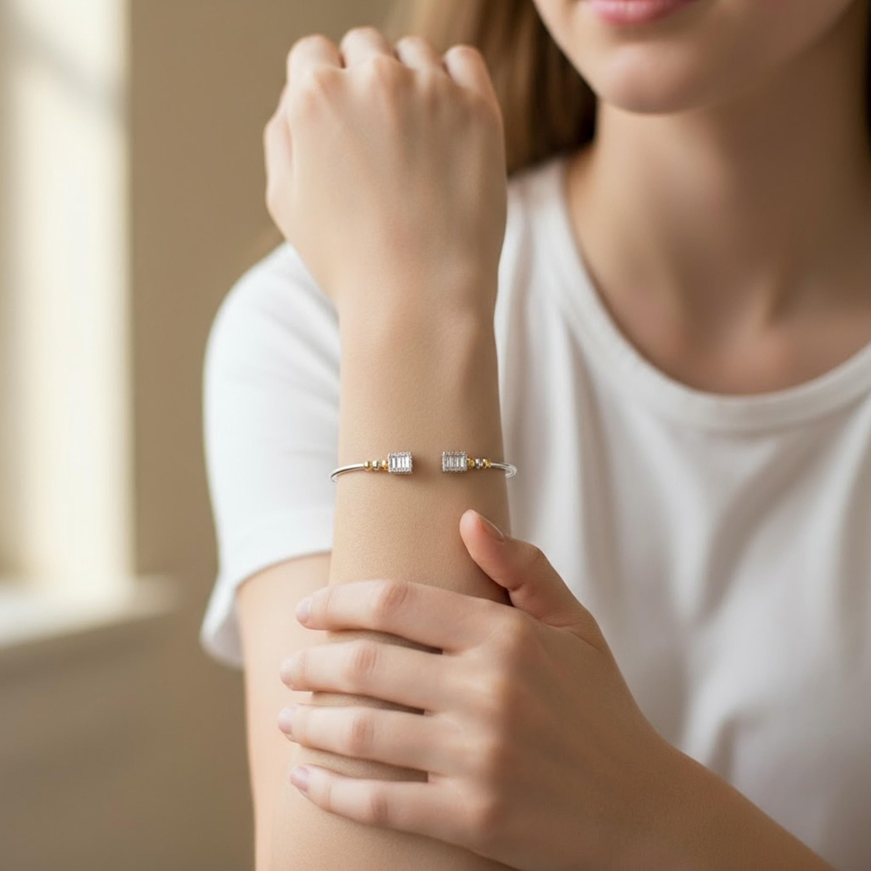 10 White Round Diamonds: 0.12 Carats
14 White Baguette Diamonds: 0.32 Carats
Metal: 18K Rose and White Gold, 5.28 Grams
