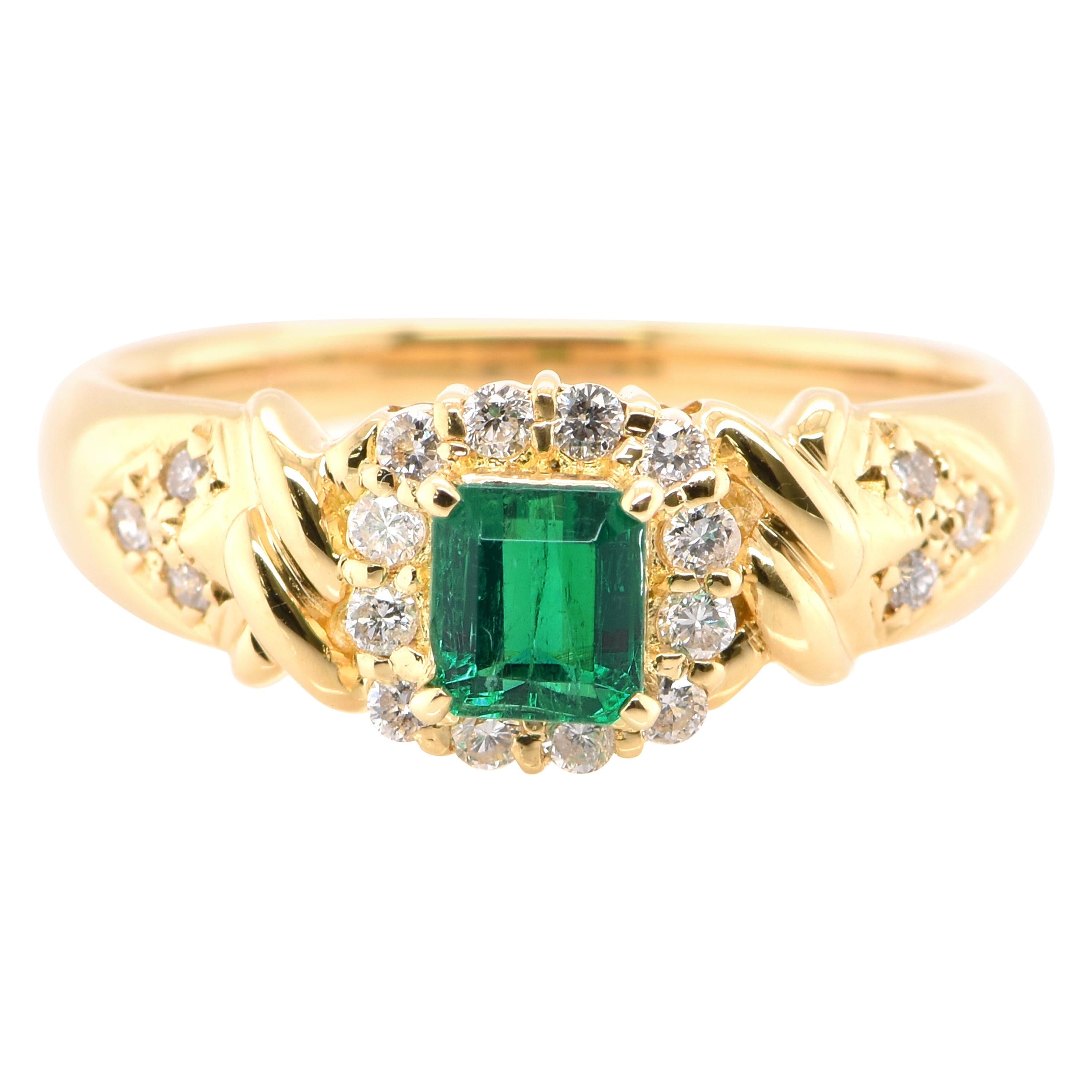 0.44 Carat Natural Emerald and Diamond Ring Set in 18 Karat Yellow Gold