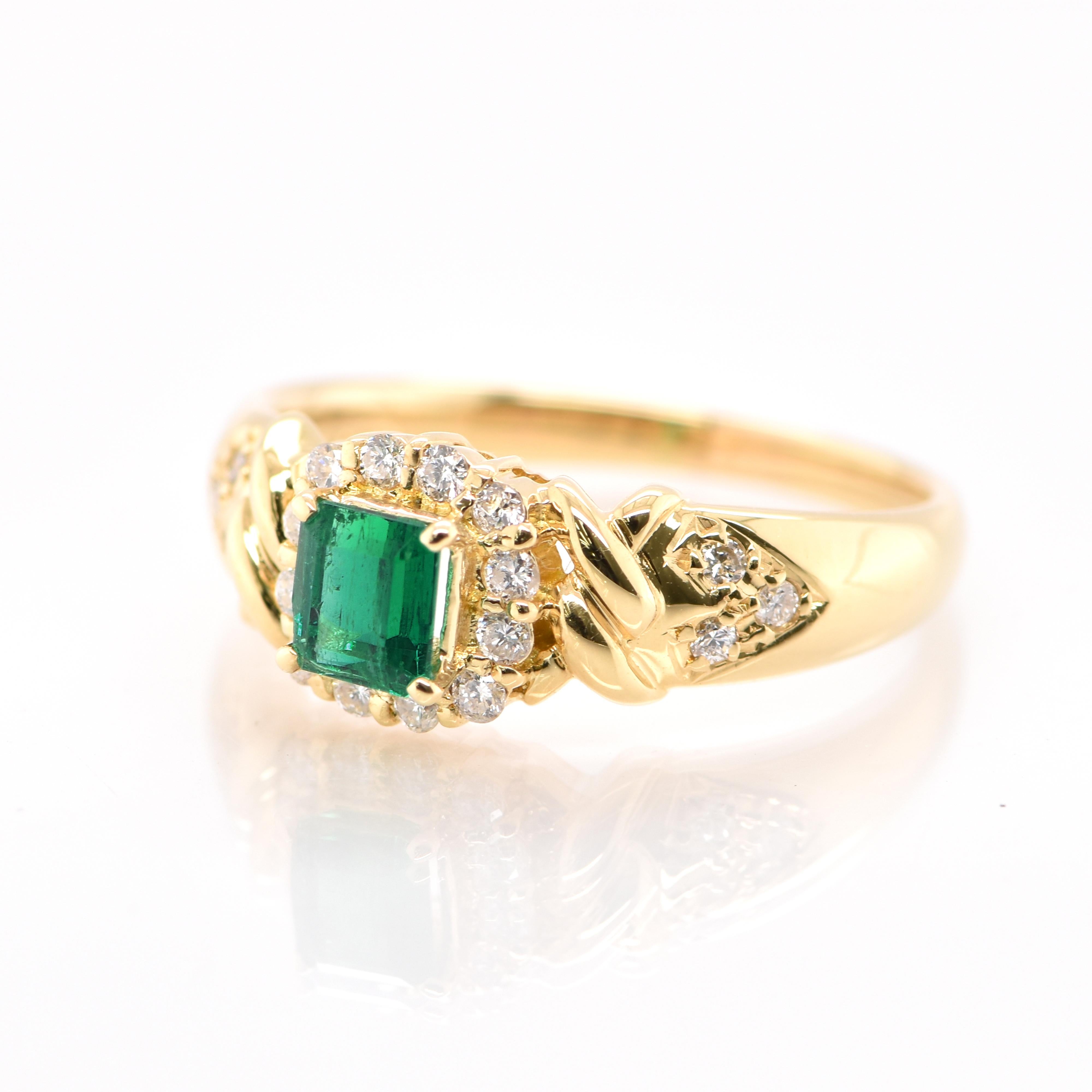A stunning Engagement Ring featuring a 0.44 Carat Natural Emerald and 0.23 Carats of Diamond Accents set in 18 Karat Yellow Gold. People have admired emerald’s green for thousands of years. Emeralds have always been associated with the lushest