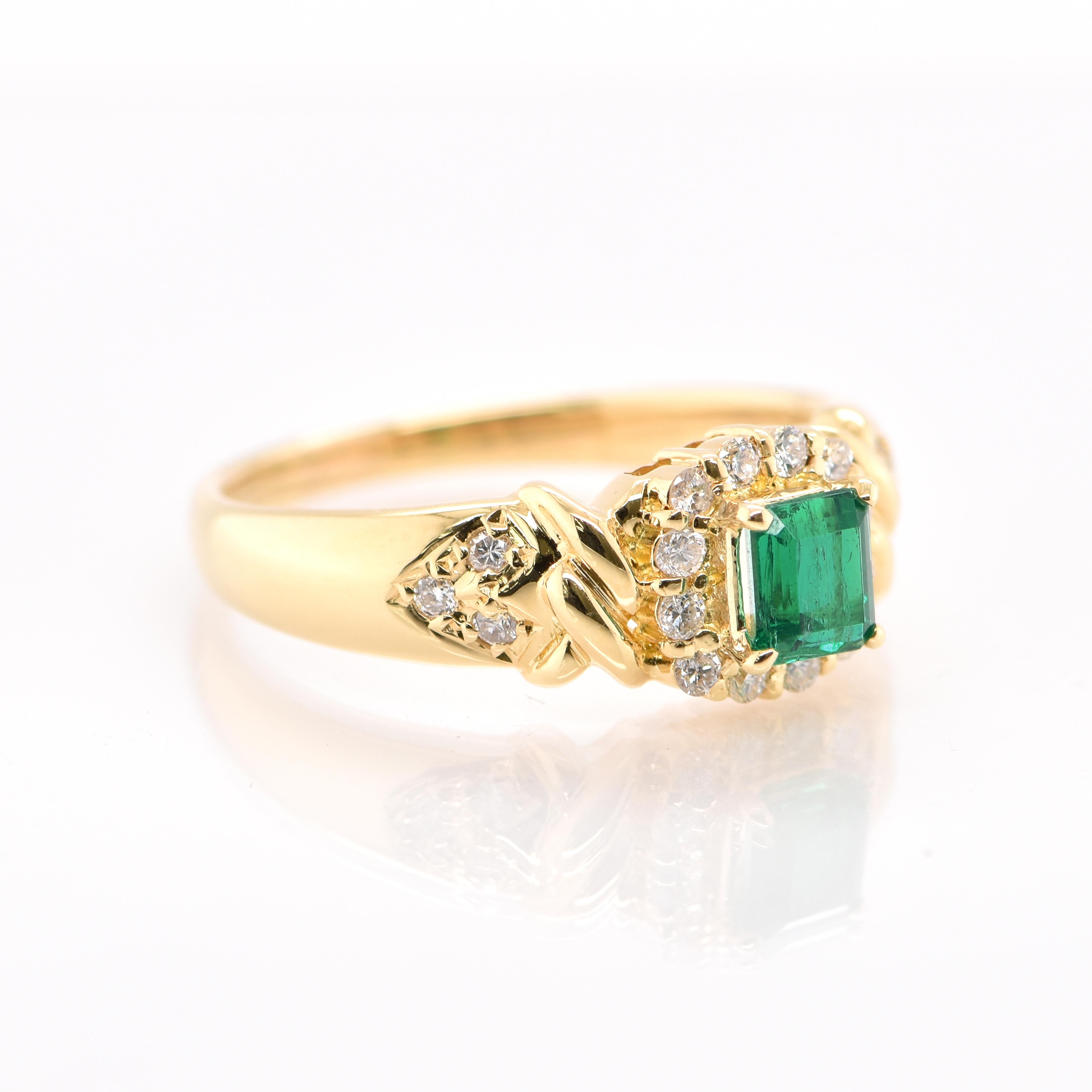 Modern 0.44 Carat Natural Emerald and Diamond Ring Set in 18 Karat Yellow Gold