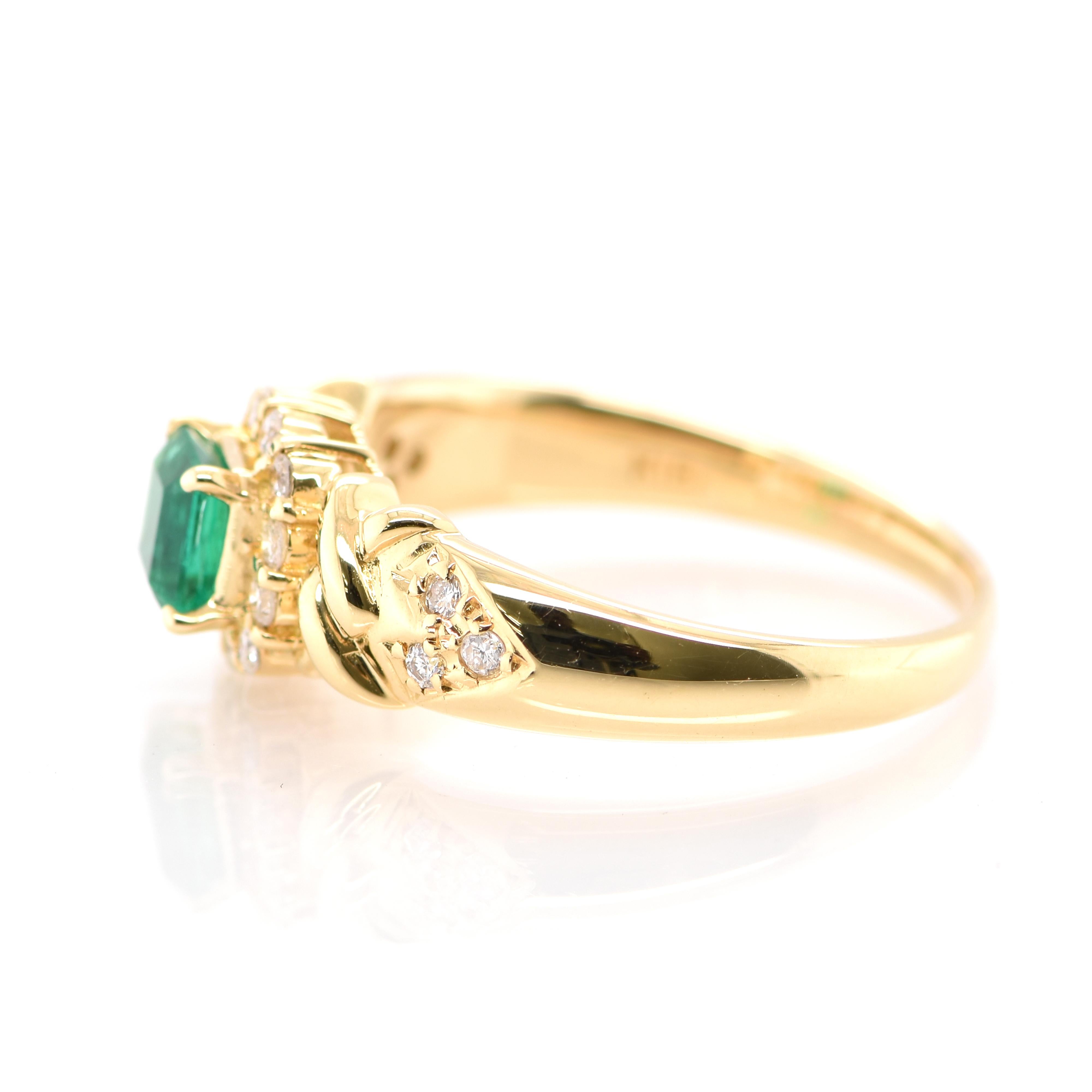 Emerald Cut 0.44 Carat Natural Emerald and Diamond Ring Set in 18 Karat Yellow Gold