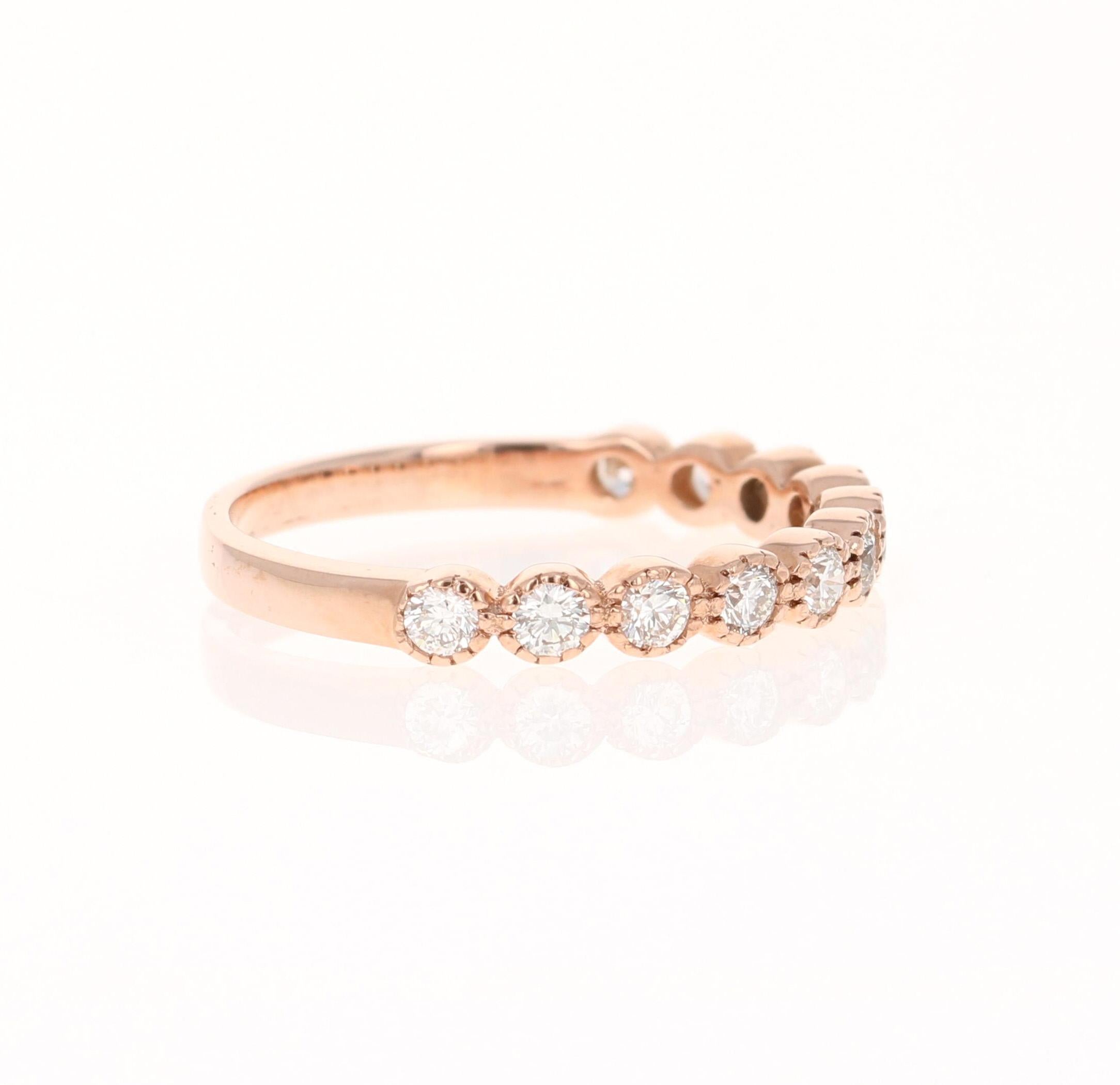 A beautiful band that can be worn as a single band or stack with other bands in other colors of Gold 

This ring has 11 Round Cut Diamonds that weigh 0.44 Carats. The clarity and color of the diamonds are VS-H.

Crafted in 14 Karat Rose Gold and has