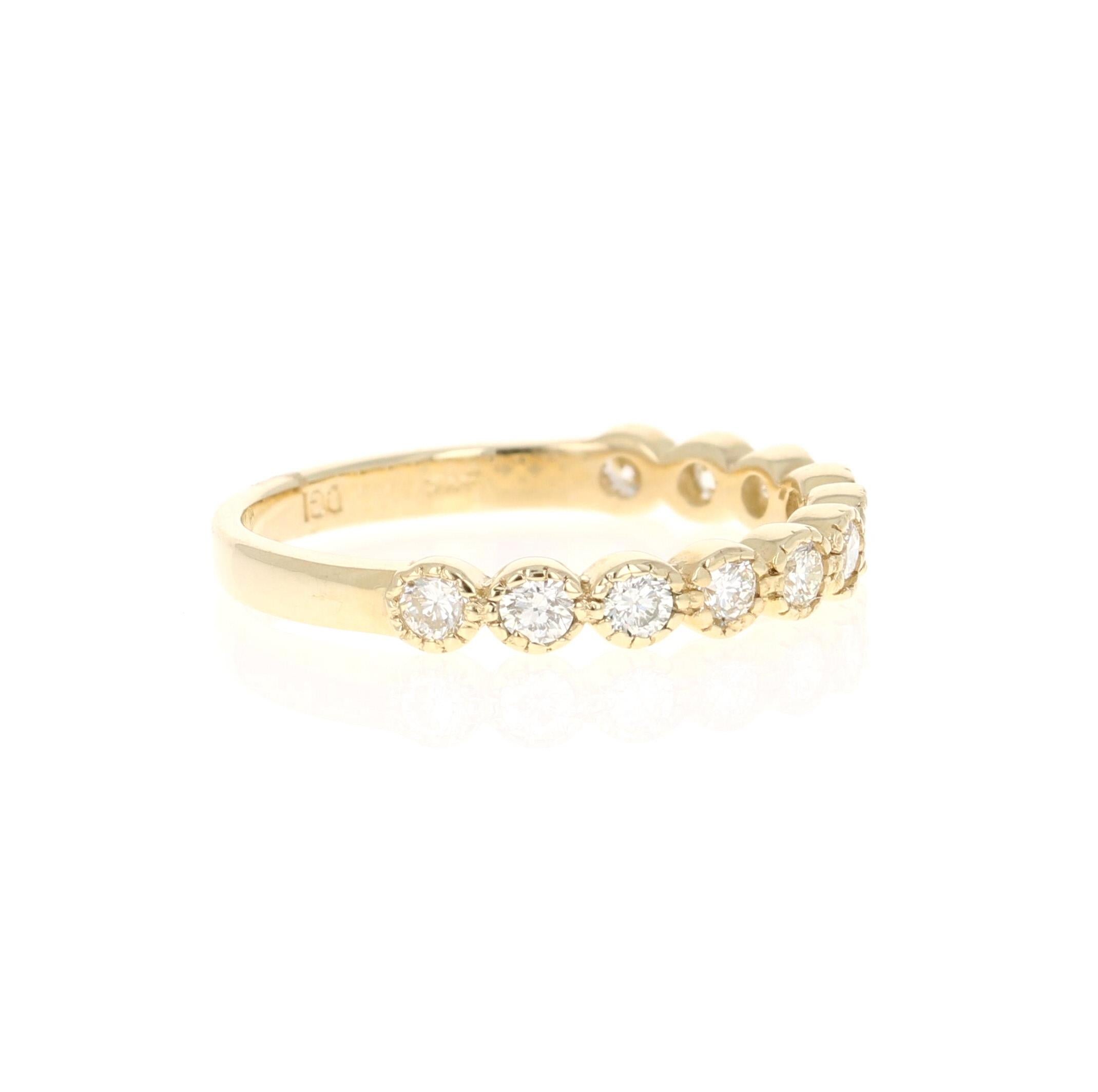 A beautiful band that can be worn as a single band or stack with other bands in other colors of Gold! 

This ring has 11 Round Cut Diamonds that weigh 0.44 Carats. The clarity and color of the diamonds are VS-H.

Crafted in 14 Karat Yellow Gold and