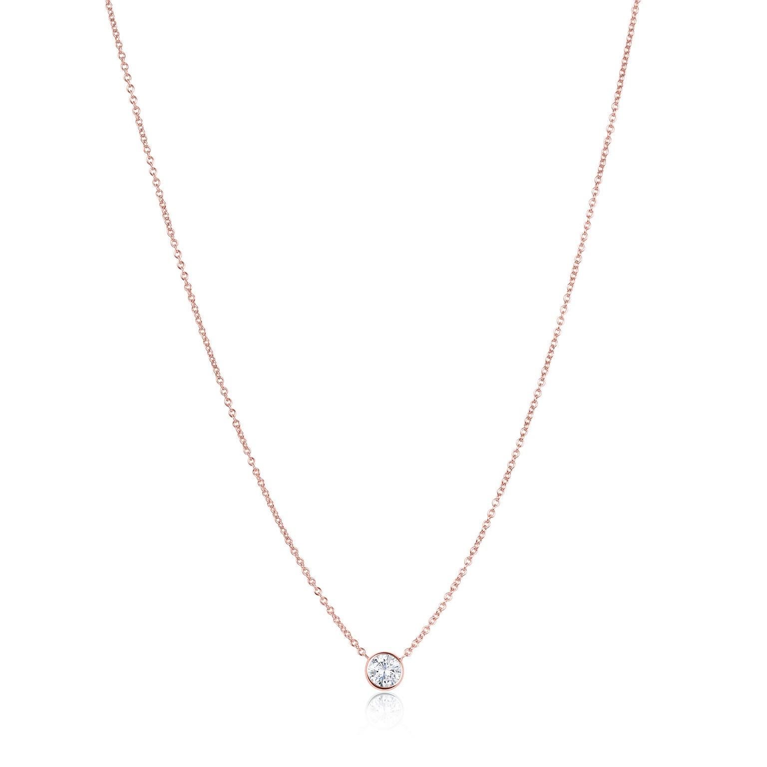 This stunning pendant necklace set in Italian hand made rose gold  setting  featuring a charming round  brilliant cut diamond, weighing 0.44 carats. F color SI2 clarity.
The incredible craftsmanship not often found on pendants this size has the