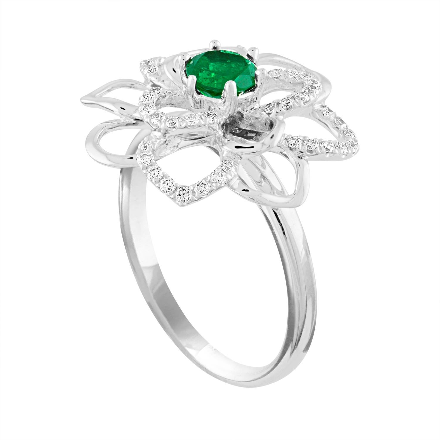 Stunning Emerald Diamond Ring
The ring is 18K White Gold
The Round Emerald is 0.44 Carats
There are 0.26 Carats in Diamonds F/G VS/SI
The size is a 6.75, sizable.
The ring weighs 4.5 grams