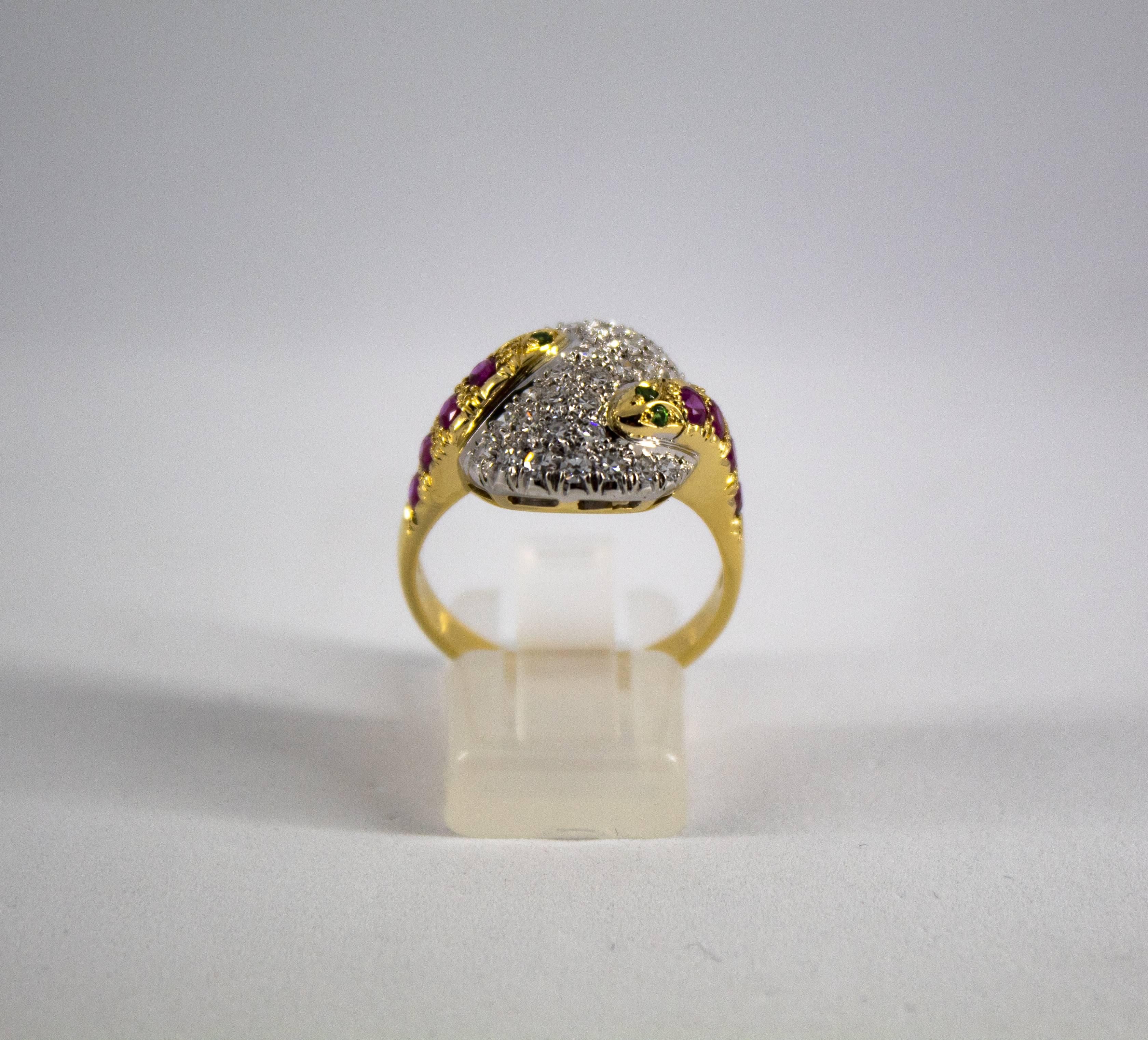 This Ring is made of 18K Yellow Gold.
This Ring has 0.90 Carats of White Diamonds.
This Ring has 0.40 Carats of Rubies.
This Ring has 0.04 Carats of Tsavorite.
Size ITA: 17 USA: 8
We're a workshop so every piece is handmade, customizable and