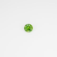 0.44 ct, Faceted Russian Demantoid with bissolite inclusions
