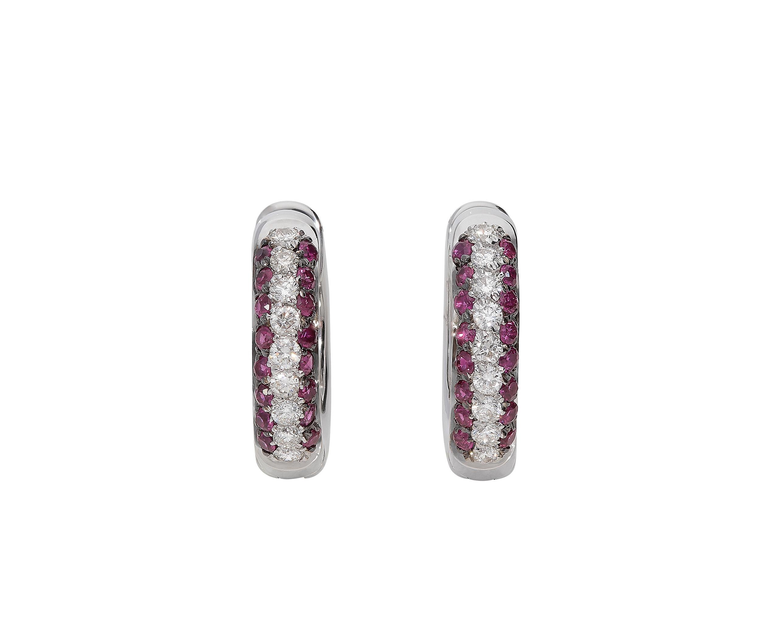 Small hoop earrings in 18kt white gold for 5,20 grams with 0,44 carats of rubies and 0,28 carats of white round brilliant diamonds color G clarity VS. 
The internal diameter of these earrings is 1,20 centimeters and the external one is 1,60