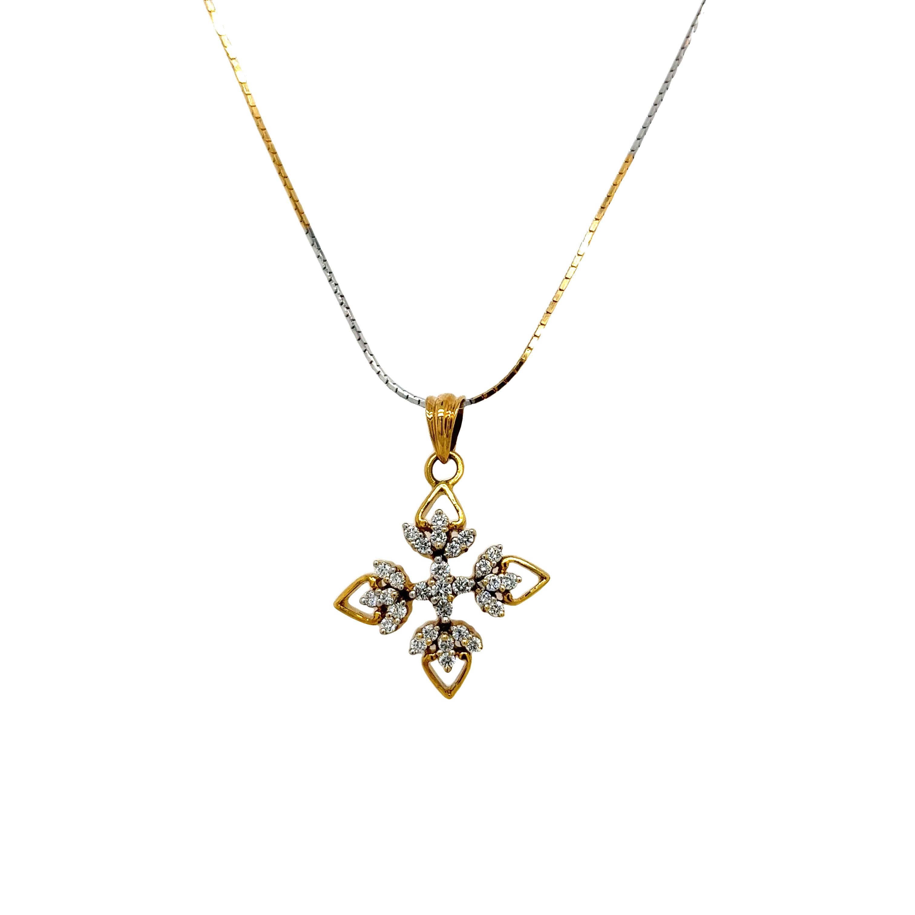 This gorgeous diamond snowflake shape pendant 
is set with a 0.44ct round brilliant cut diamond in 18ct yellow & white gold, 
The pendant is suspended from an 18ct yellow & white gold chain that measures 15 inches. 
(the pendant is tested as 18ct