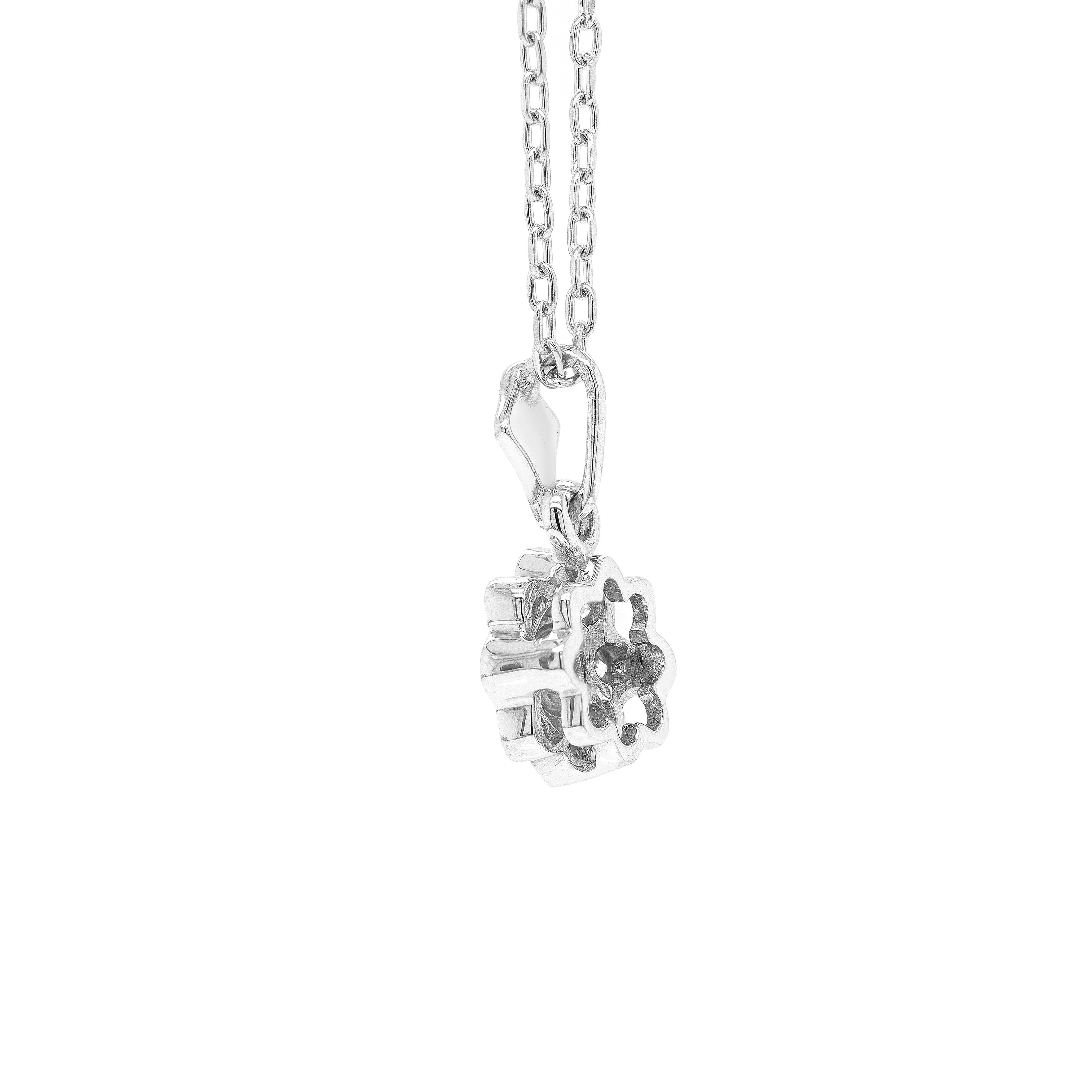 This beautiful pendant features a round brilliant cut diamond weighing 0.18ct, mounted in a rub-over, open back setting. The gorgeous centre stone is surrounded by 8 round brilliant cut diamonds weighing a total of 0.27ct, all mounted in 18 carat