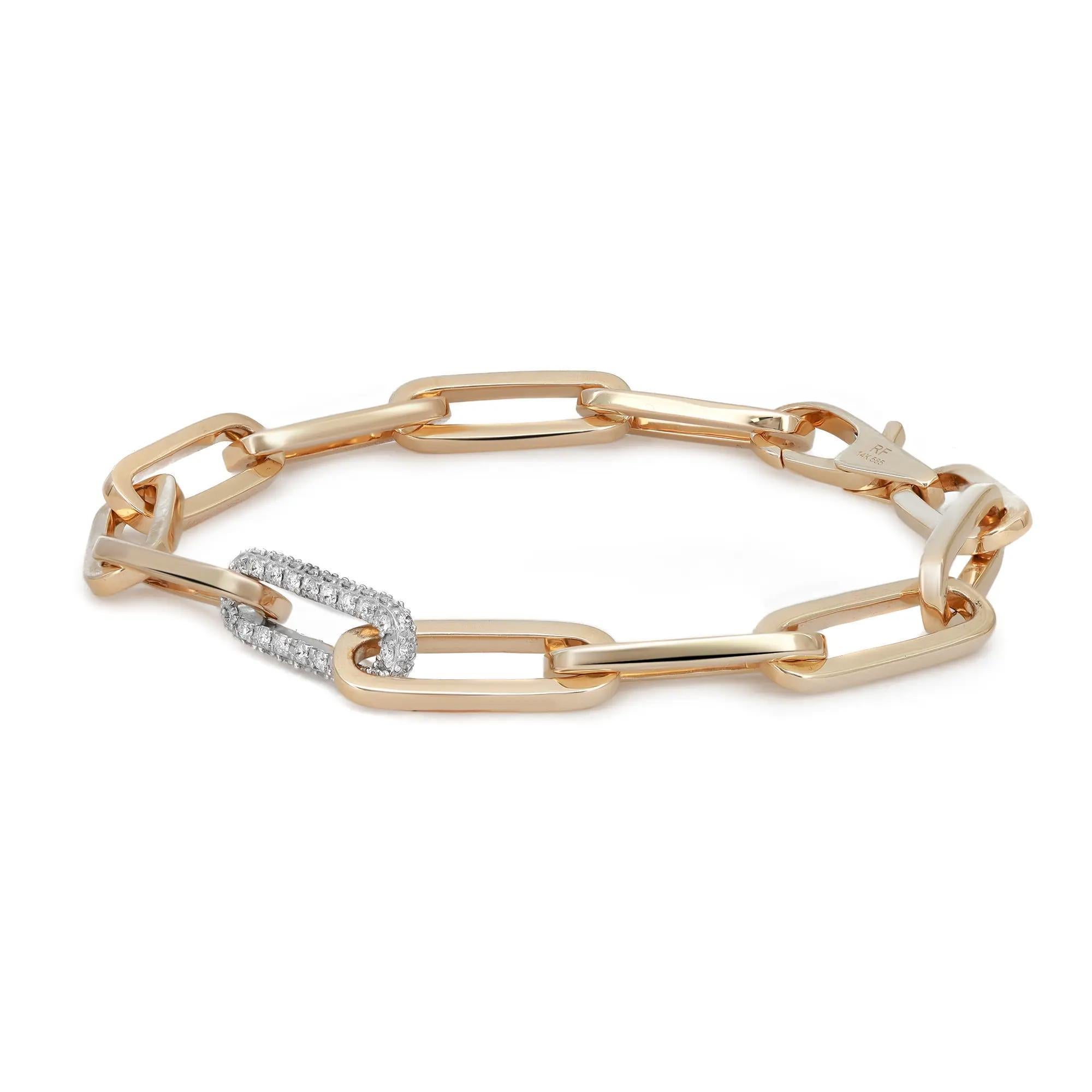 Introducing the sleek and modern paperclip-link bracelet, a sophisticated piece crafted from 14K white and yellow gold. This exquisite bracelet is adorned with shimmering pavé white diamonds, totaling 0.45 carats, featuring a single striking diamond