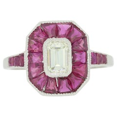 0.45 Carat Emerald Cut Diamond and Calibrated Ruby Ring